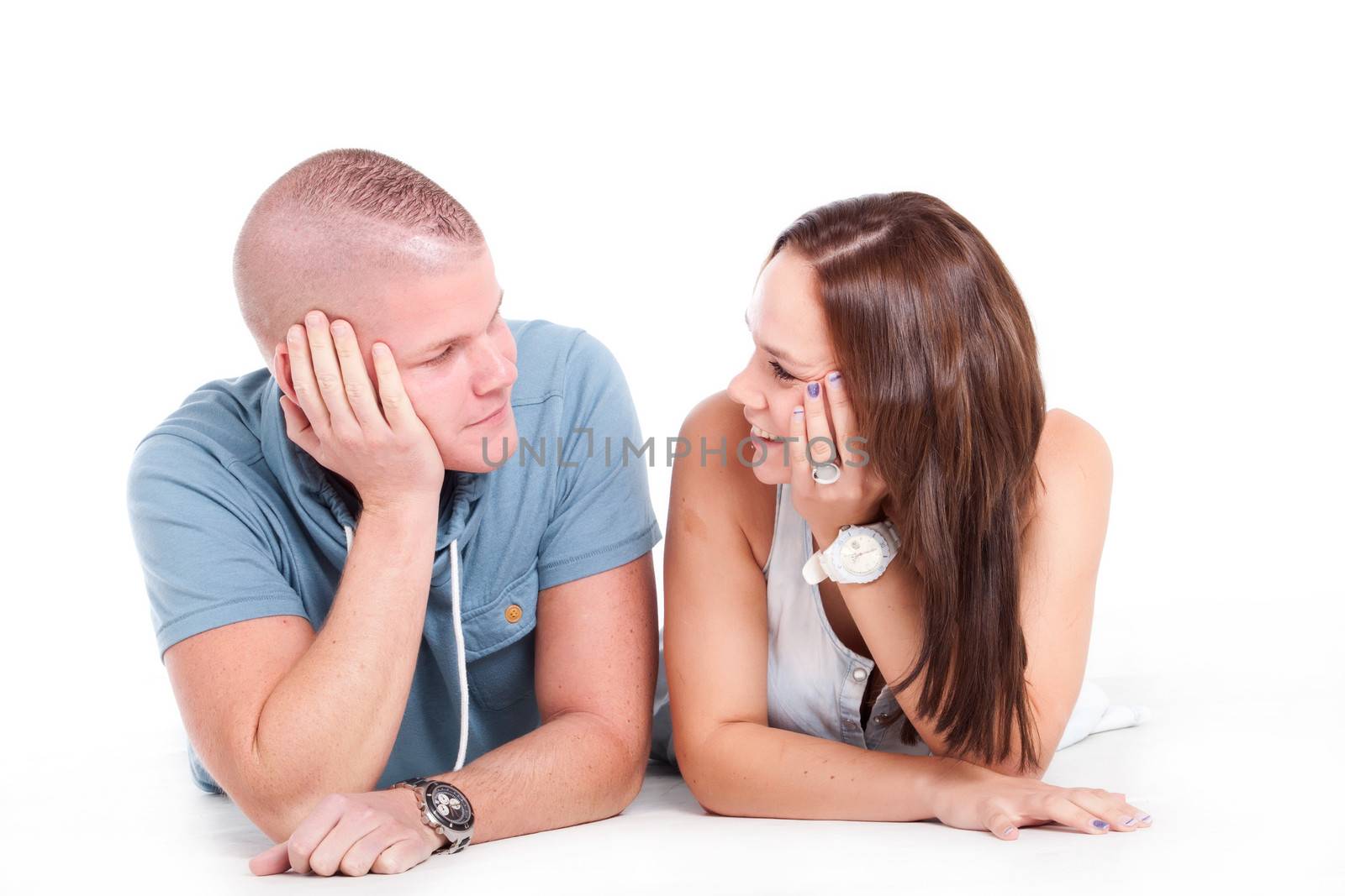 Young adults in a white studio having fun