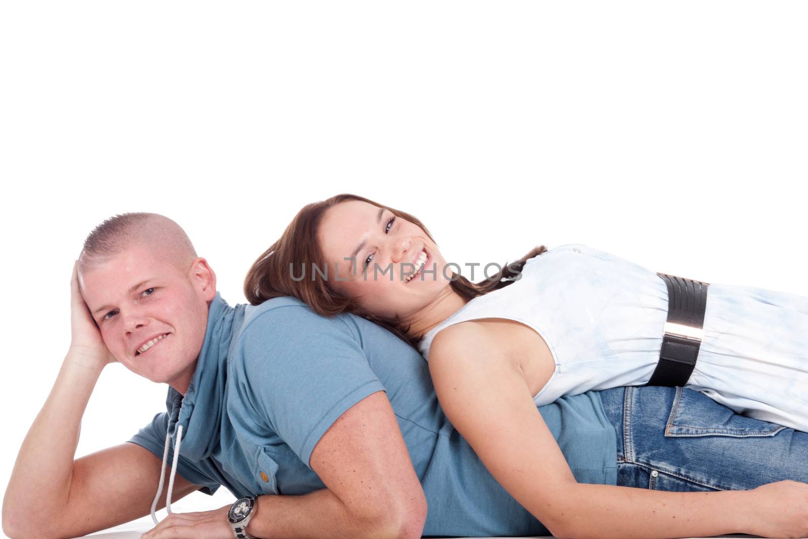 Young adults in a white studio having fun