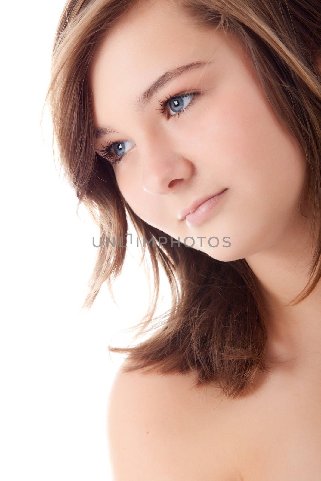 Young teenager in de studio on white