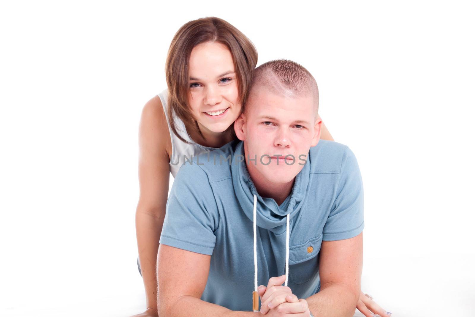 Young adults in a white studio having fun