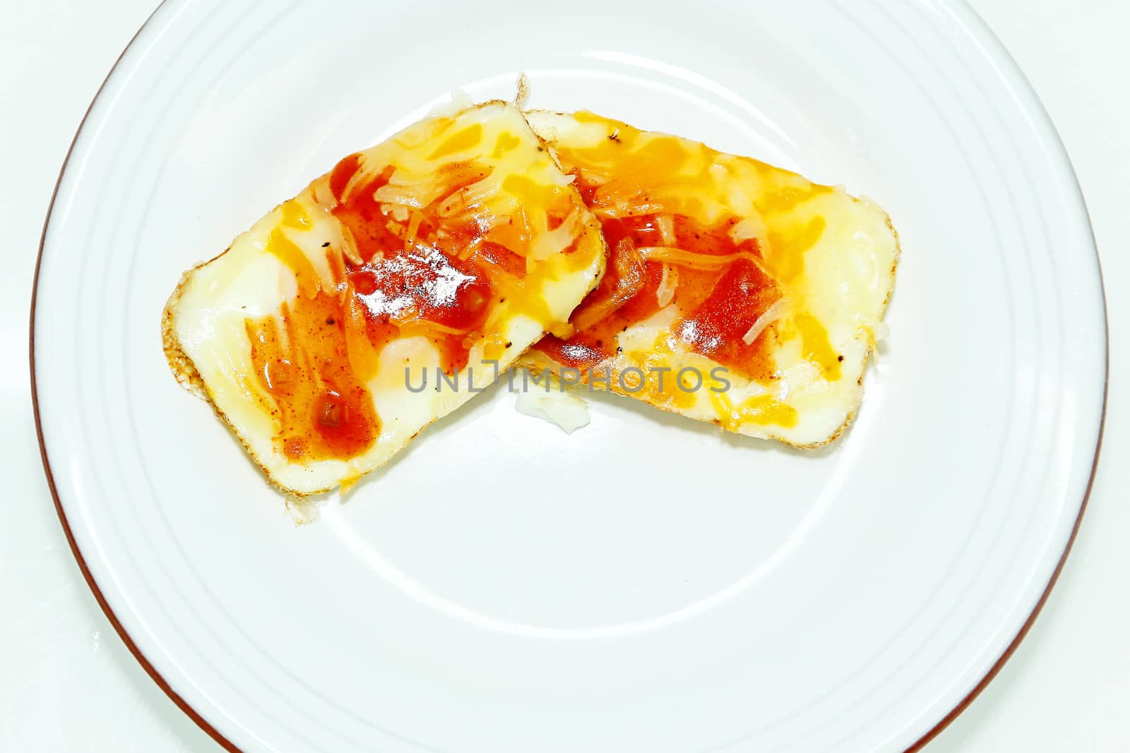 Eggs Baked in Muffin Tin with Salsa and Cheese by duplass