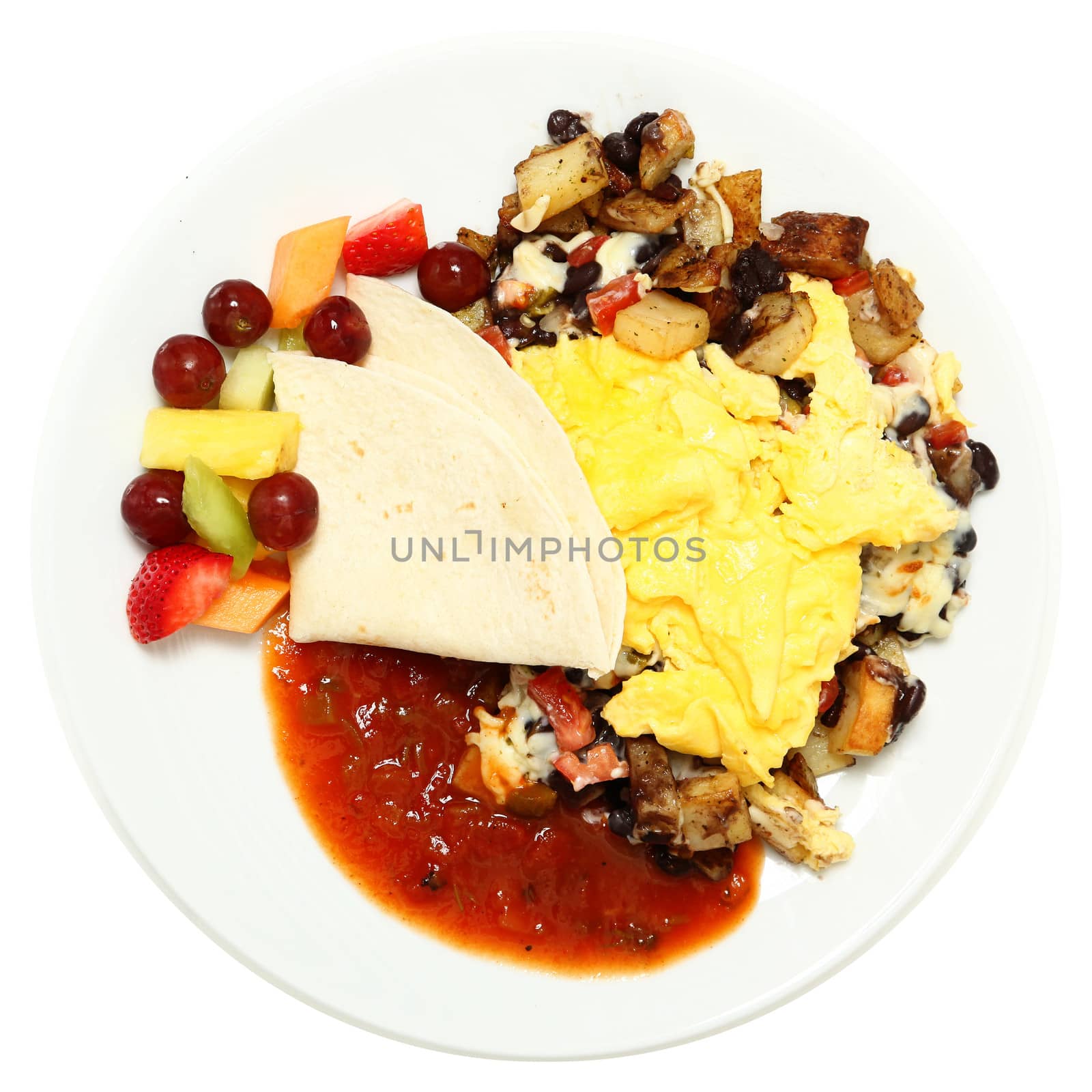 Mexican Eggs with Salsa, Potatoes, Fruit over white.