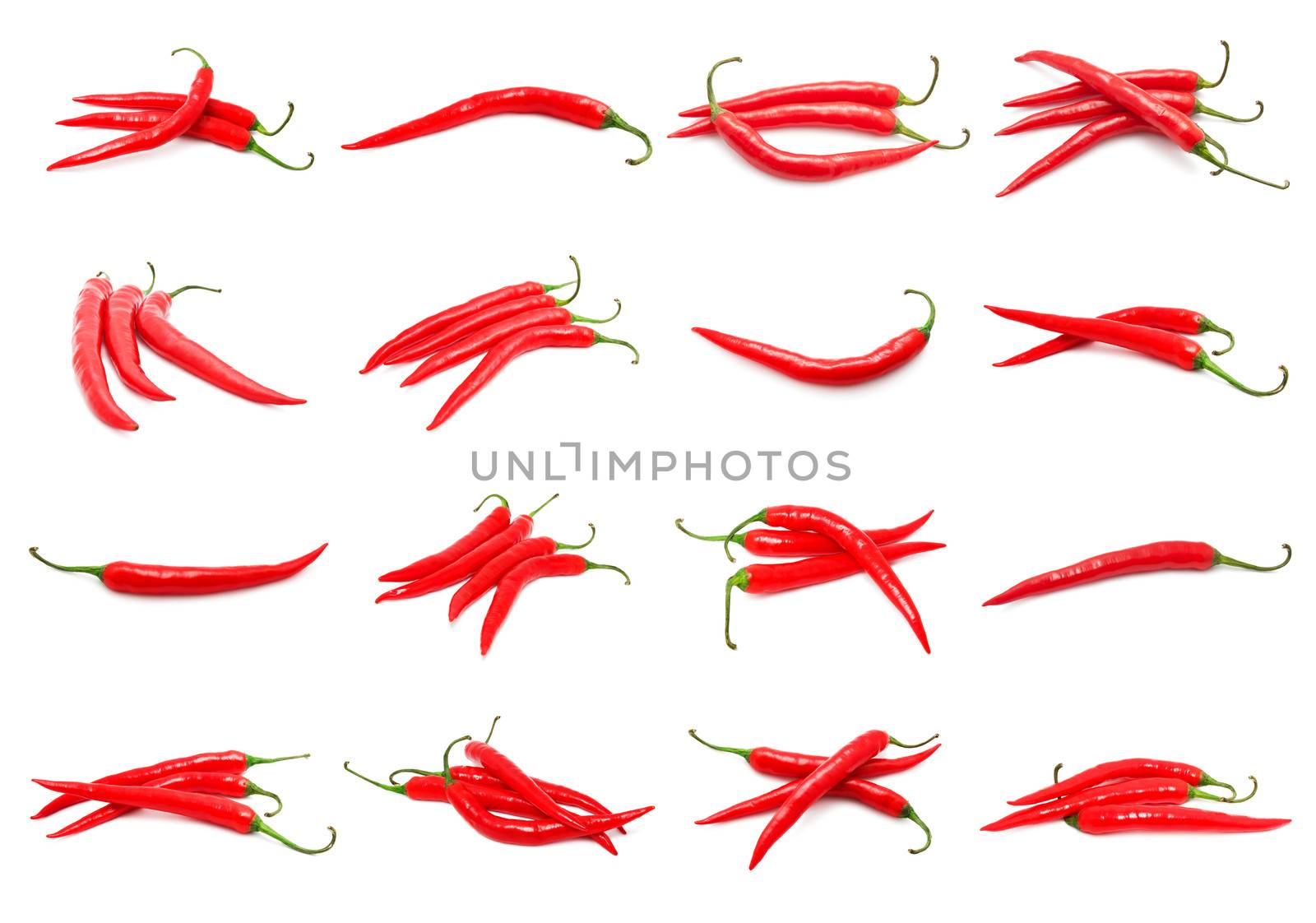 Collection of red hot chili peppers isolated on white background