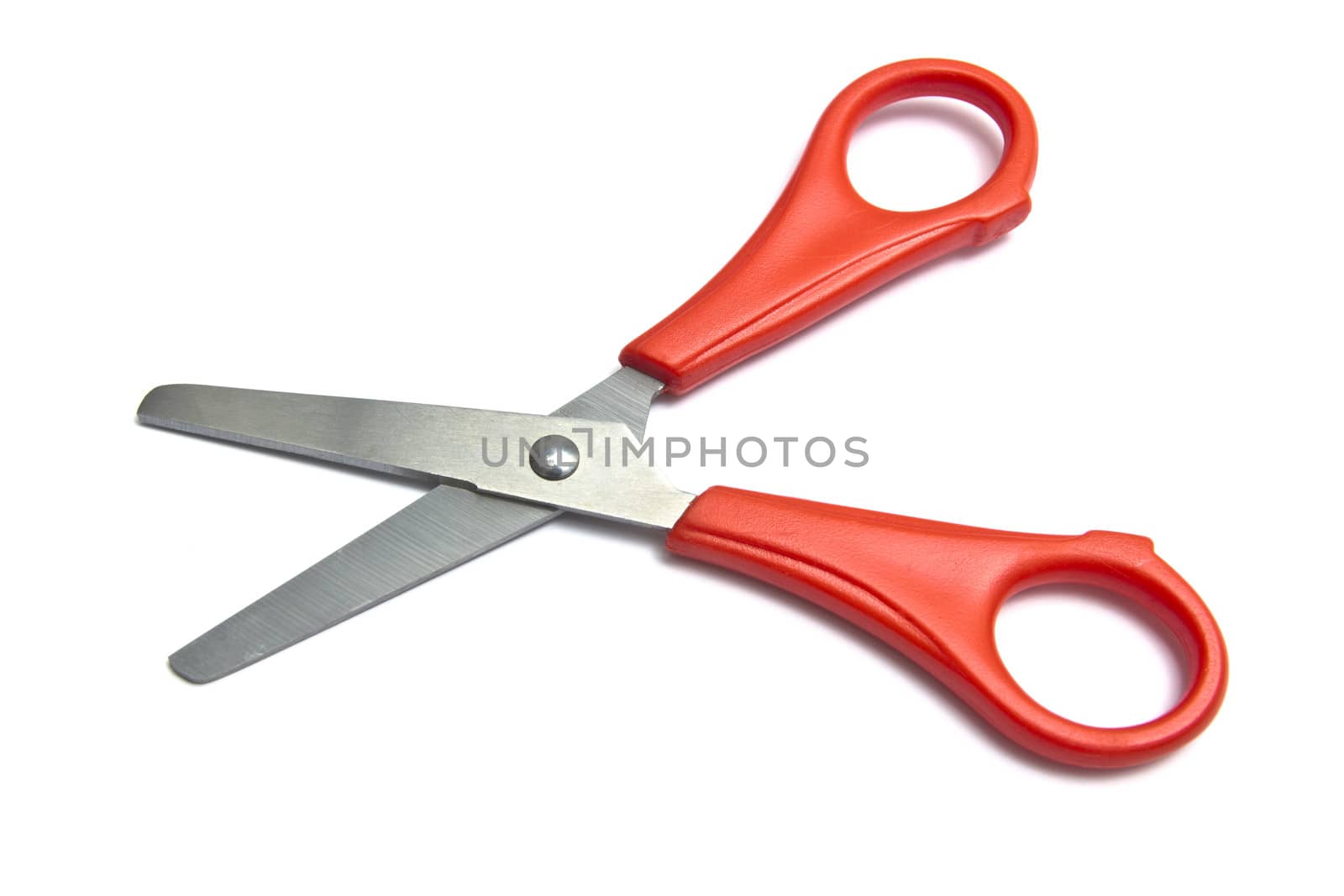 Red handled scissors isolated on white background 