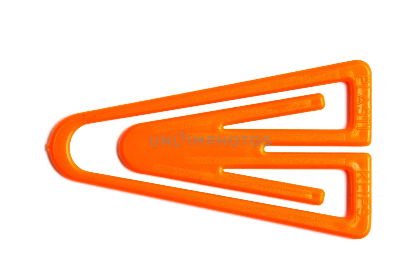 Plastic paperclip isolated on white background 
