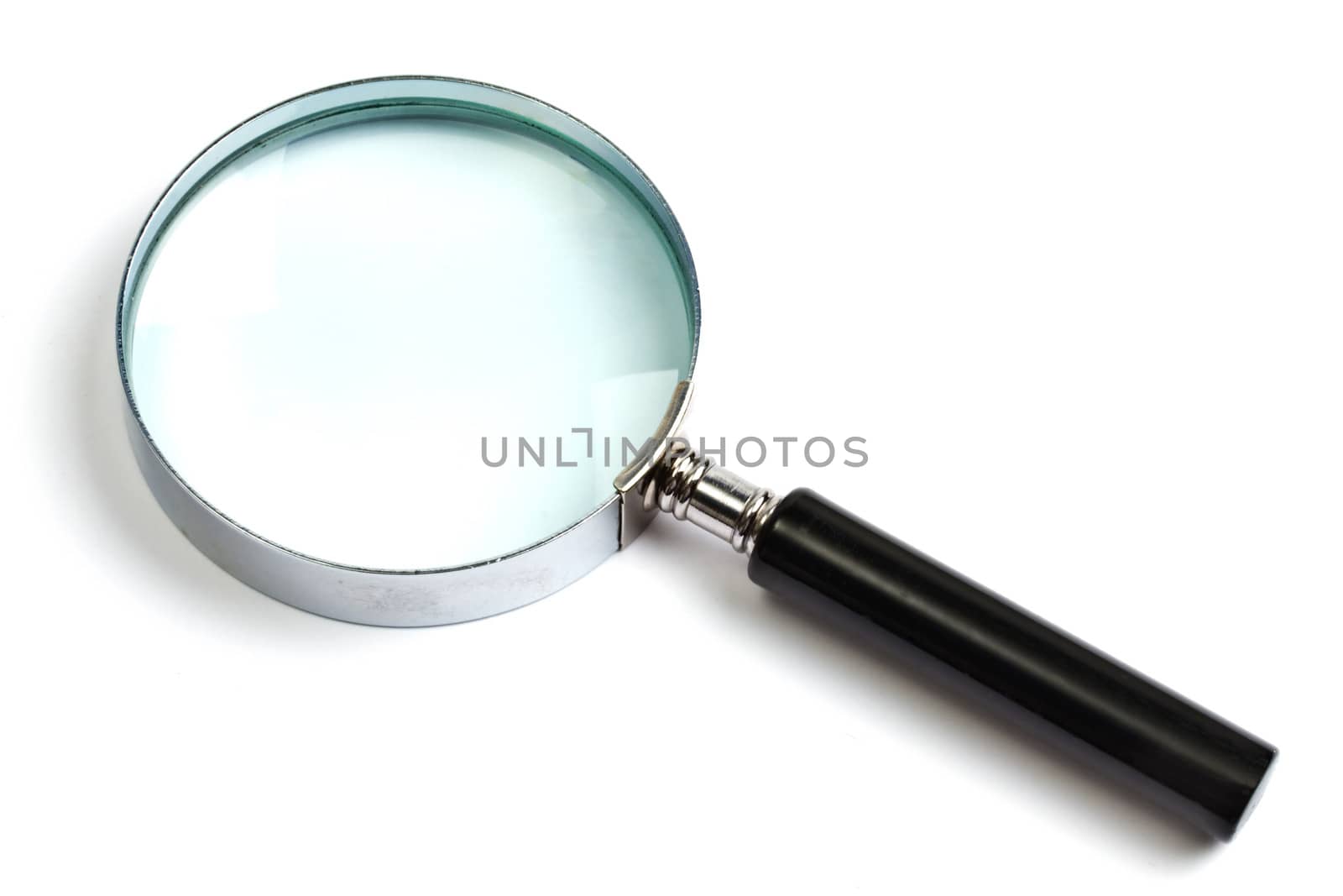 Magnifying glass on white background closeup 