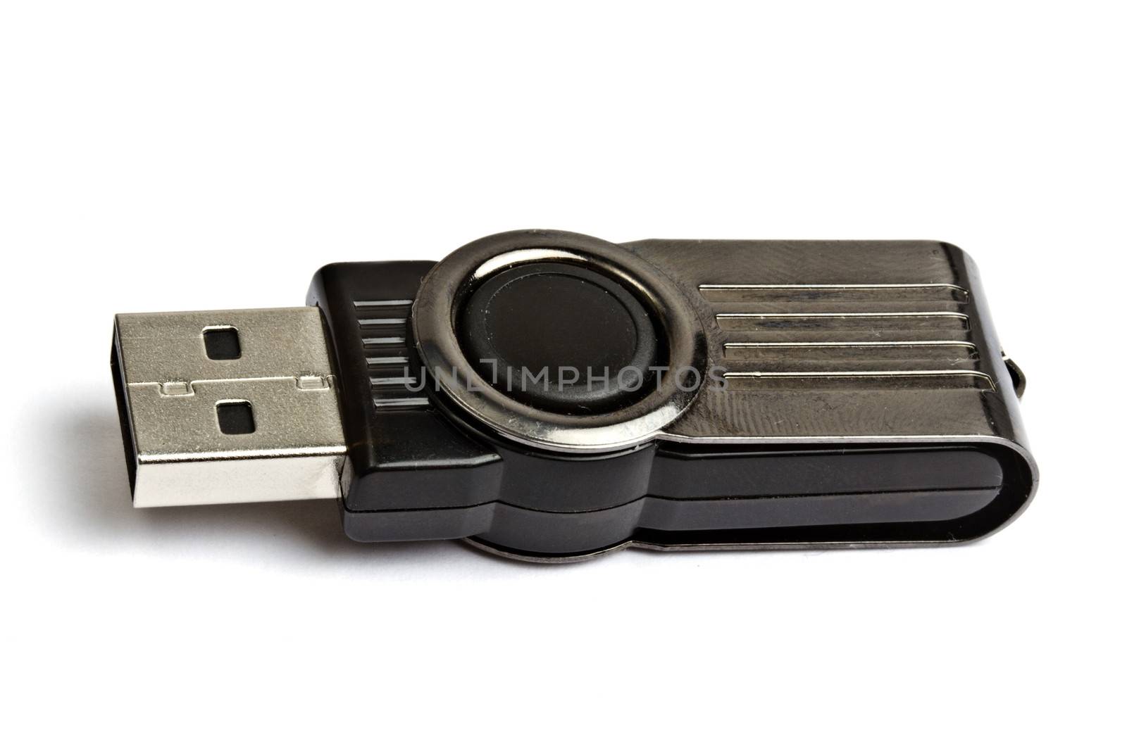 A black USB memory stick isolated on white background 