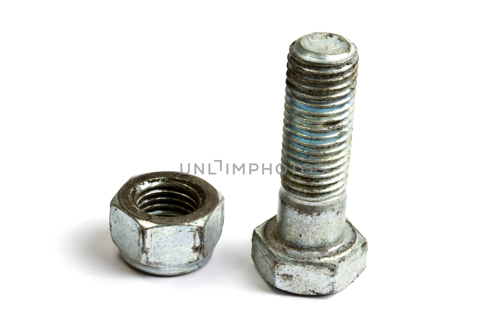 Nut and bolt isolated on white background 
