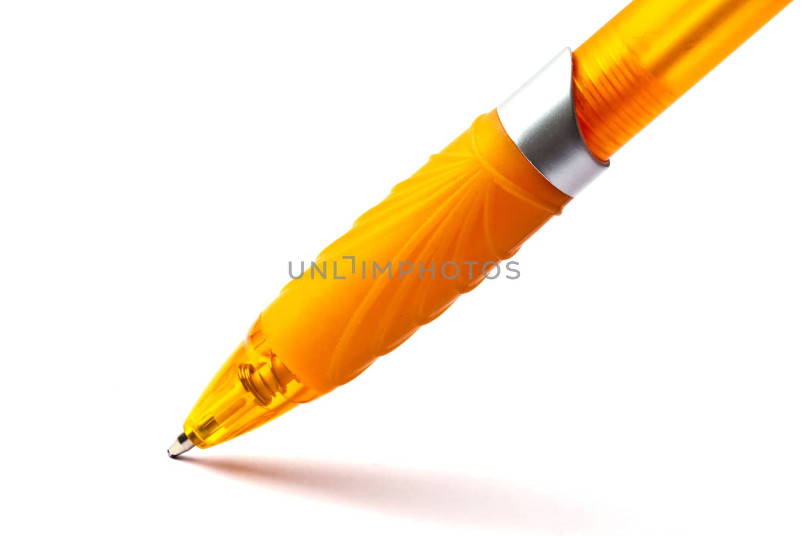 Yellow pen closeup on the white background 
