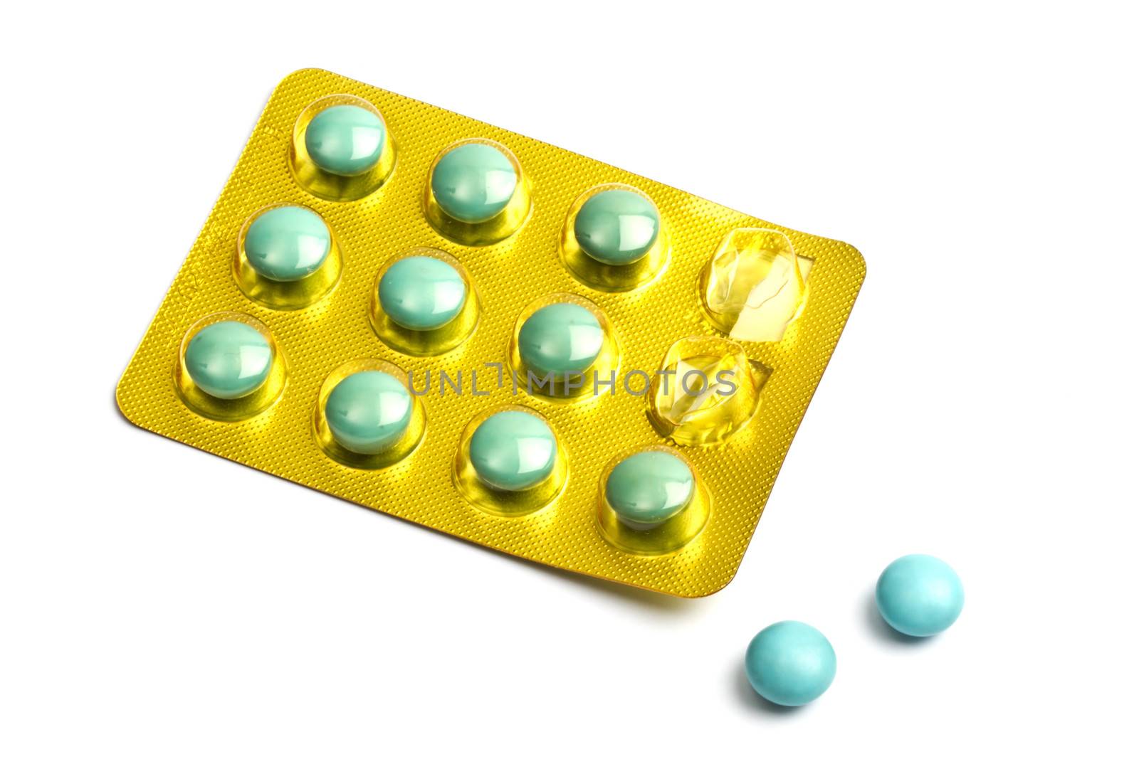 Set of green pills isolated on white background 