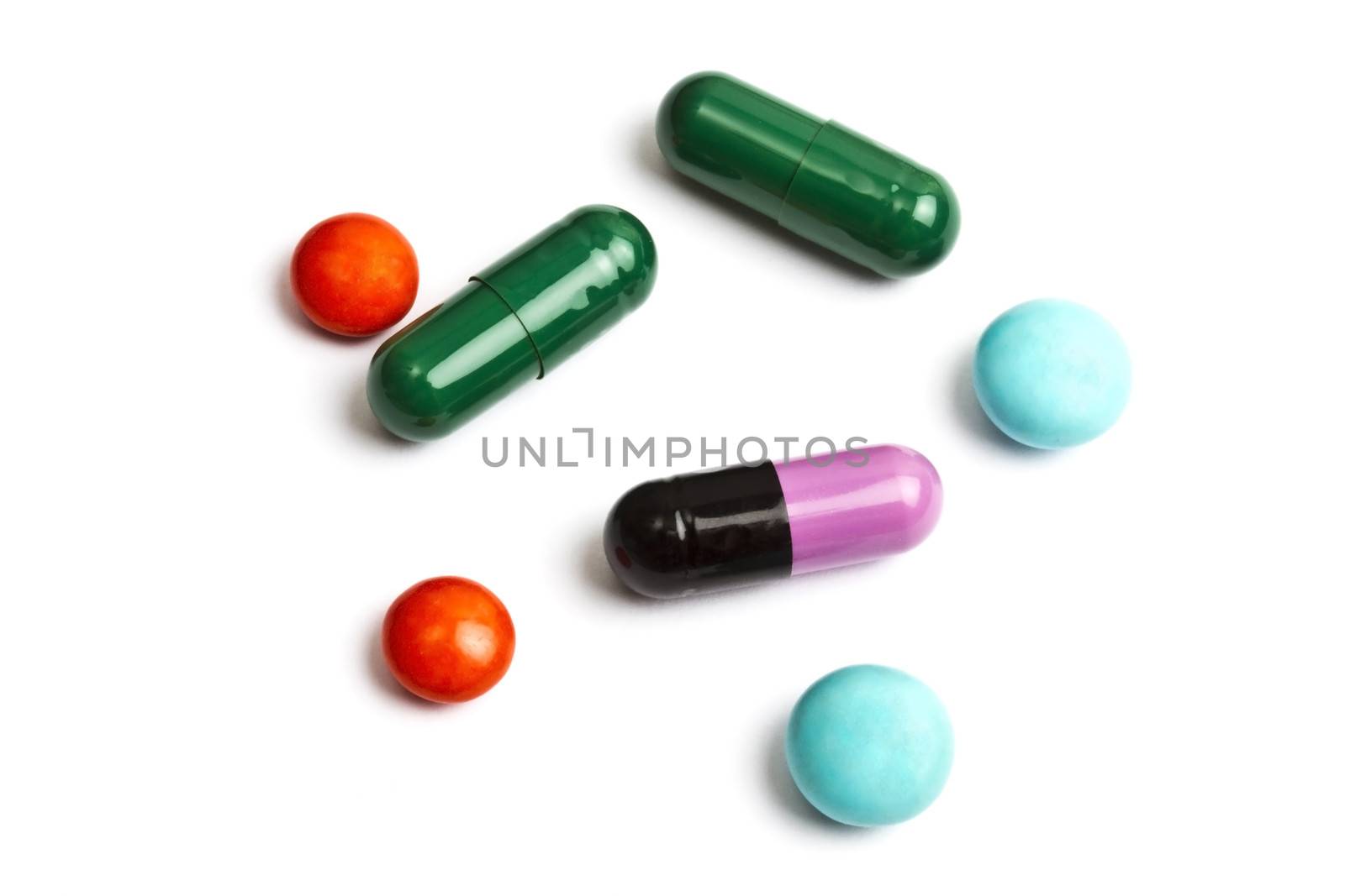 Colorful pills isolated on white background 