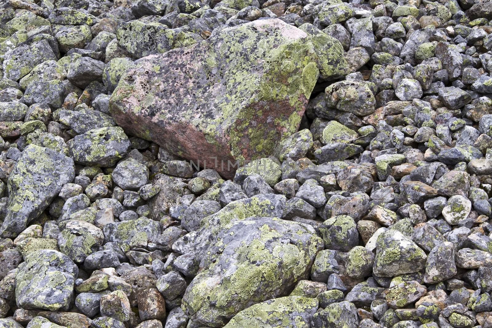 Texture of nature weathered stones in mountain closeup