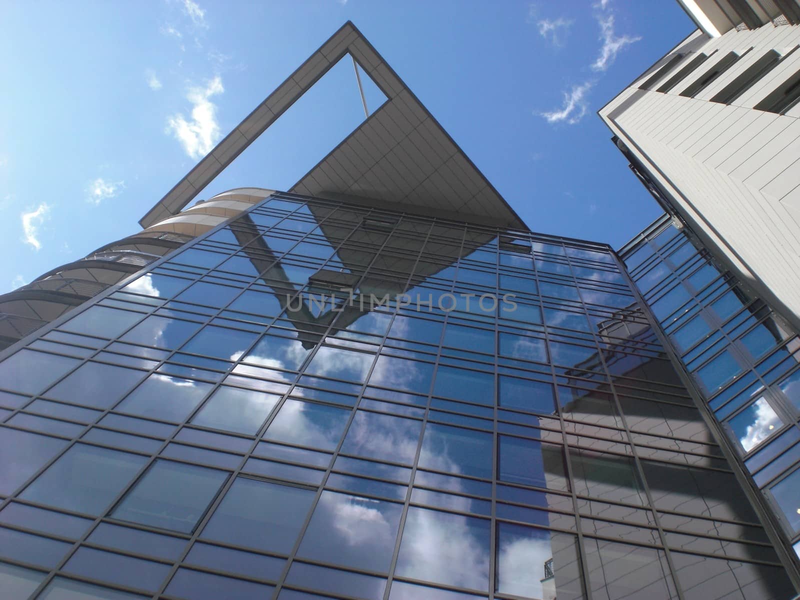 Modern tower building with frameless windows