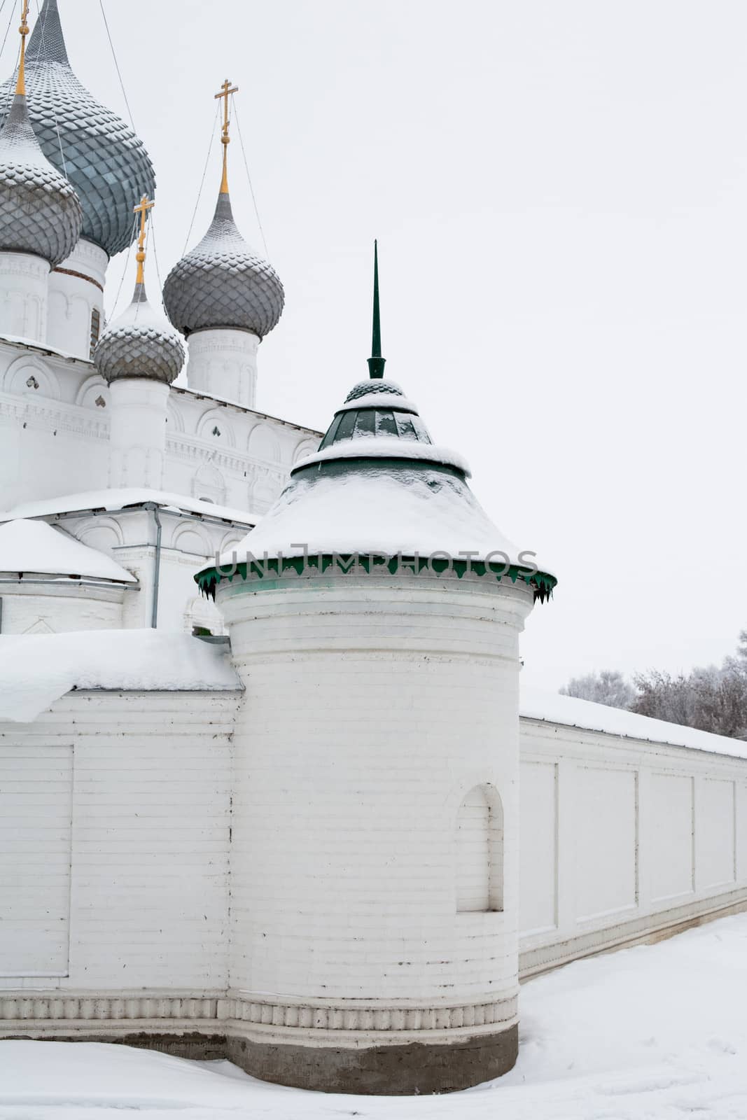 White church in winter in Uglich

