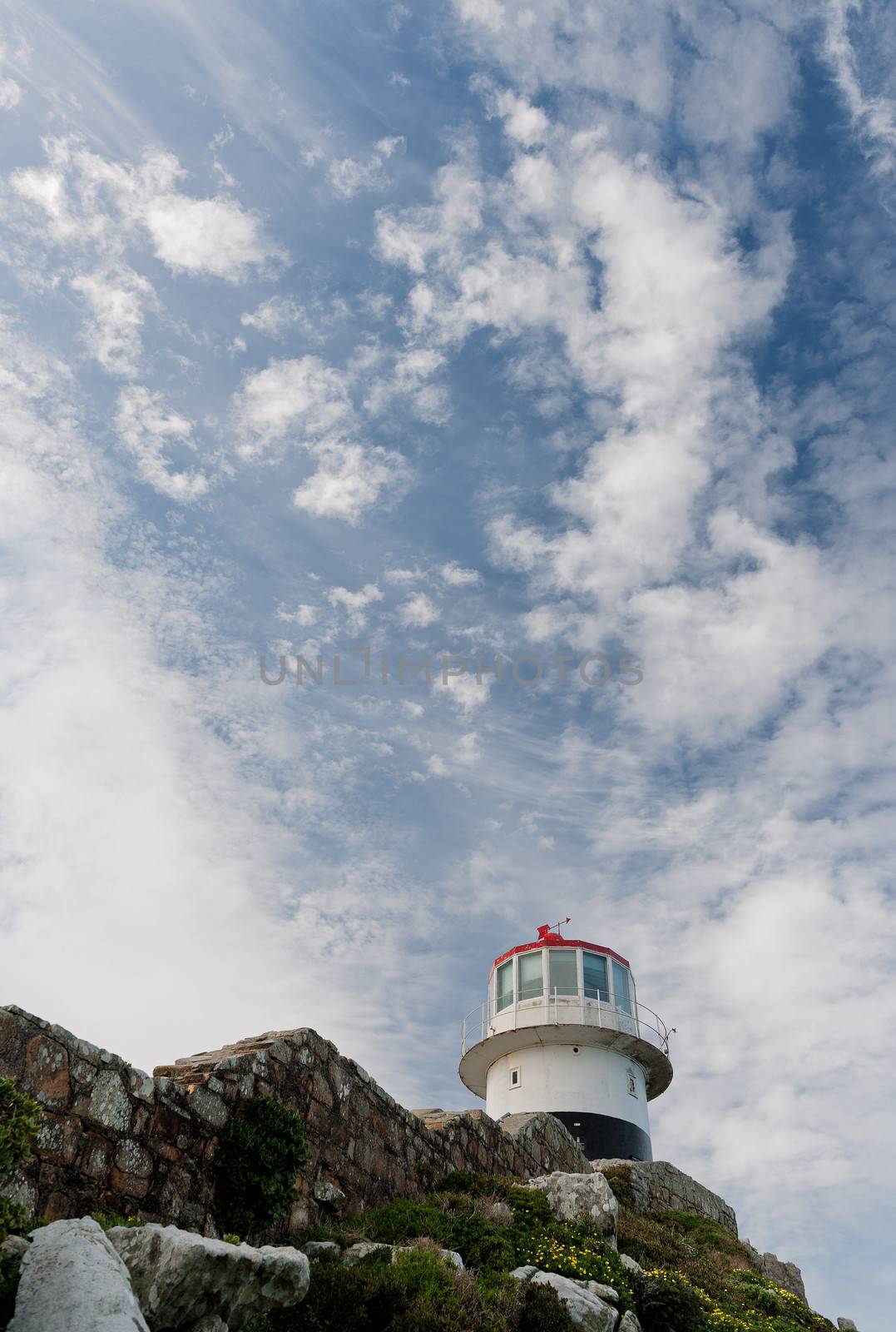 Lighthouse Cape of Good hope and blue sky with white clouds, Cape Town