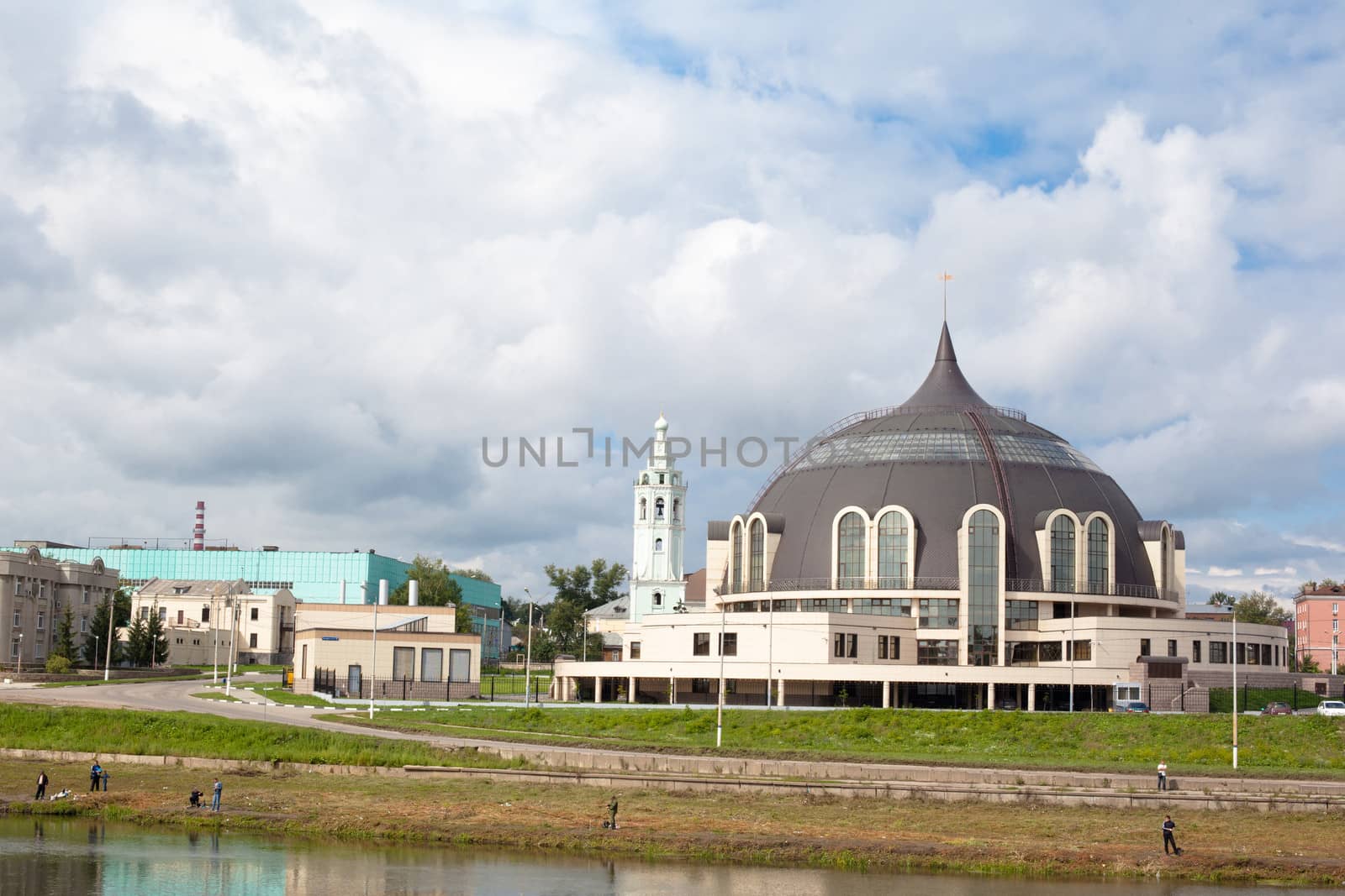 Tula cityscape with river and modern museum building
