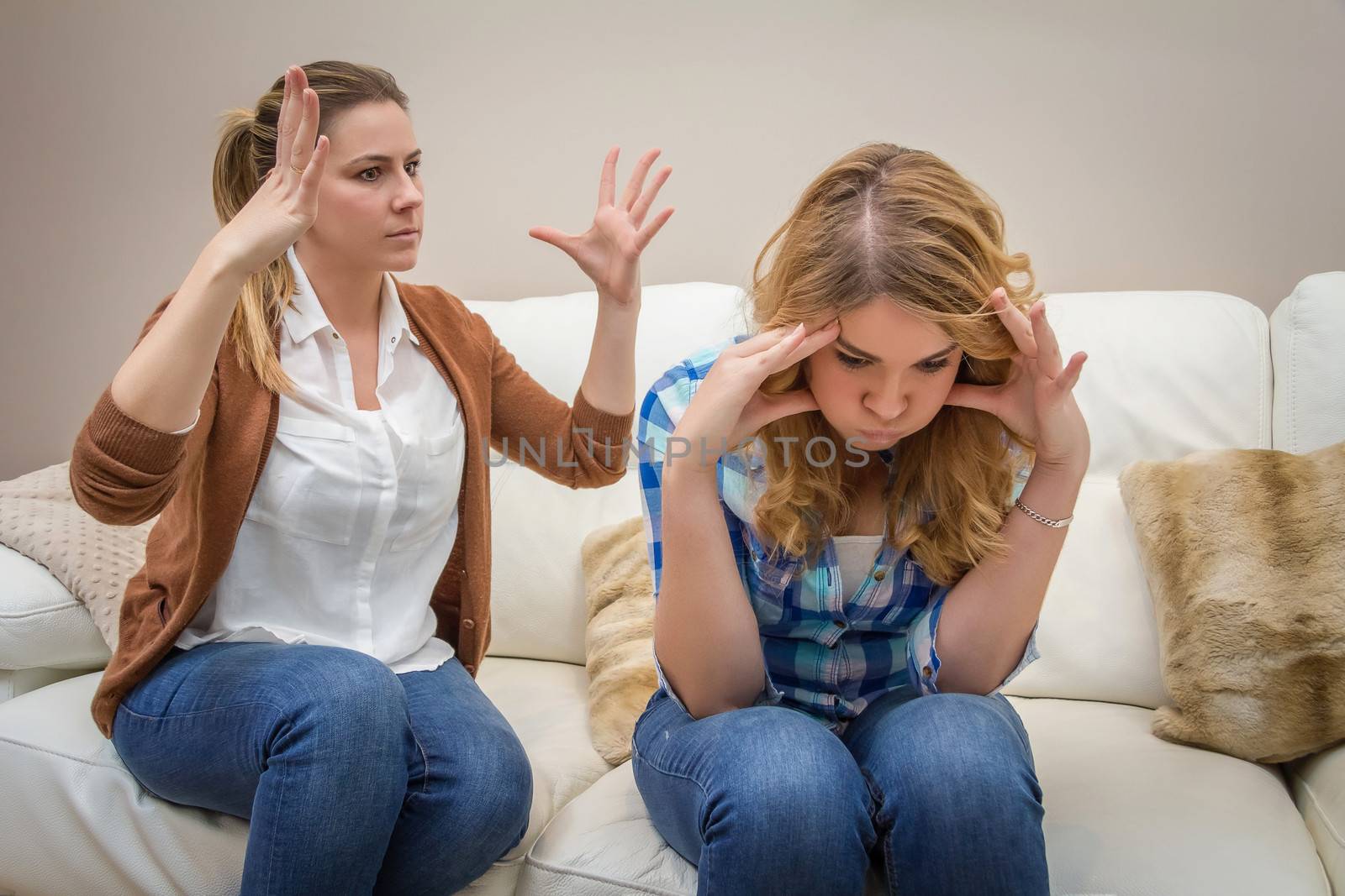 Furious mother arguing with her ​​teenage daughter by doble.d