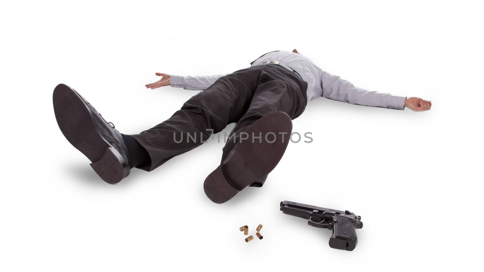 Businessman lying dead in the floor with a gun