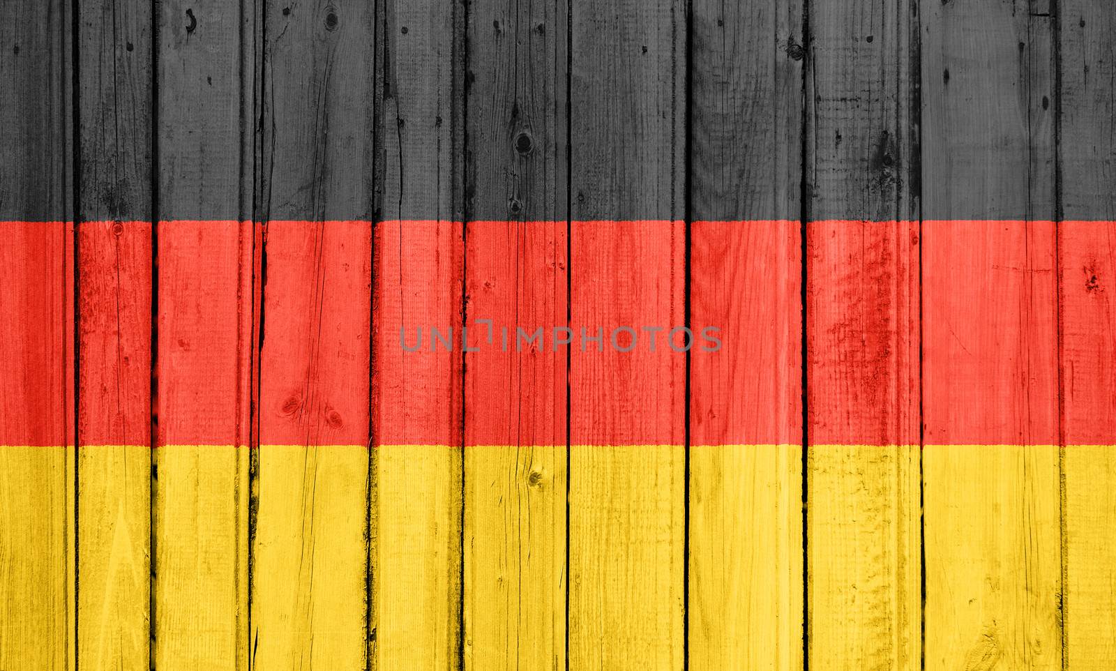 The German flag painted on a wooden fence