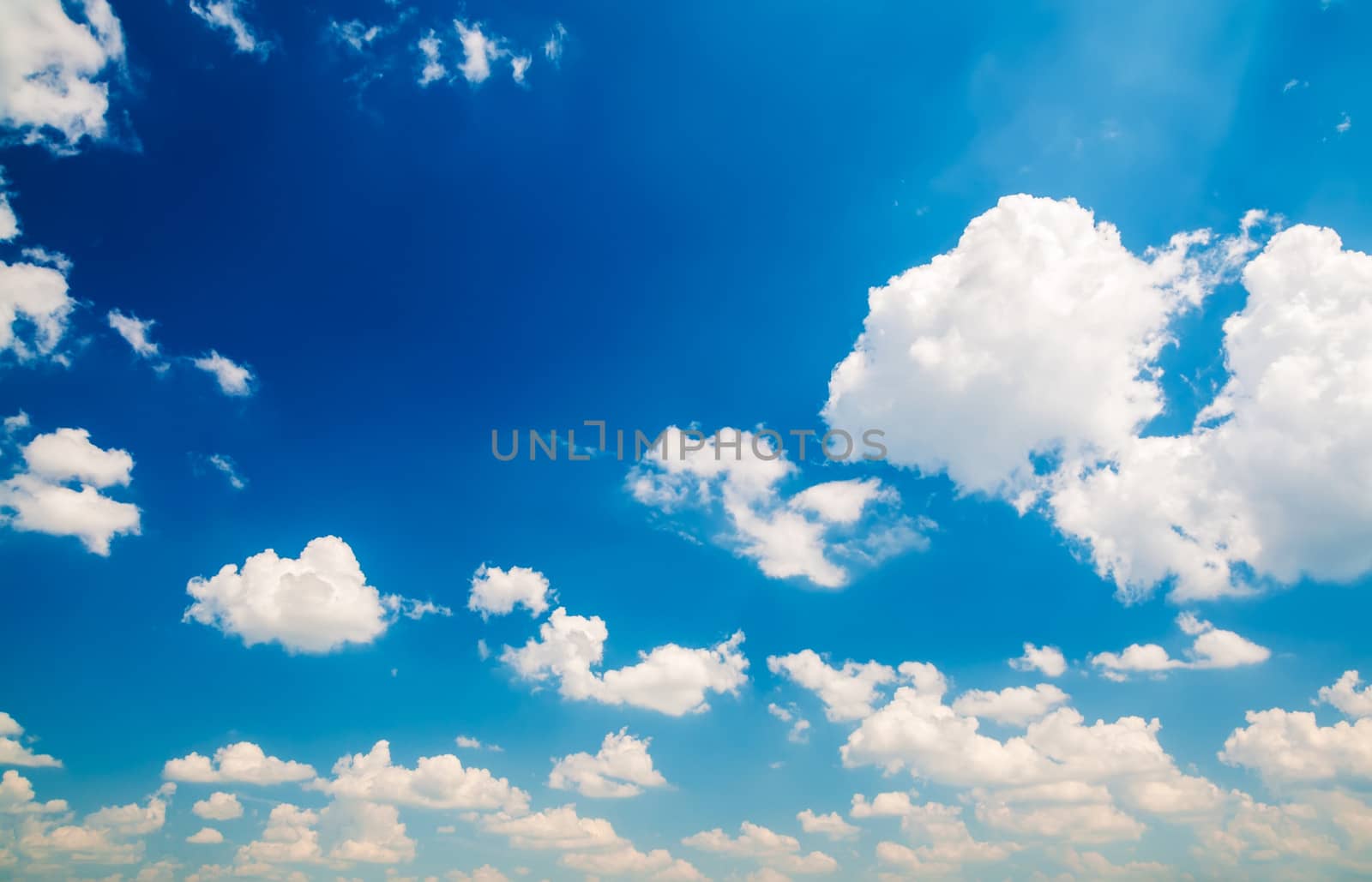 View on clouds in the blue sky background