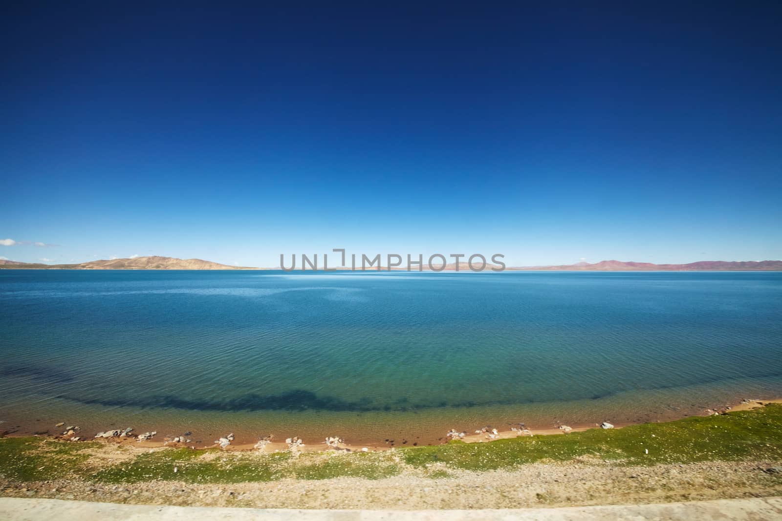A view of the blue Qinghai lake from the Qinghai Tibet train.