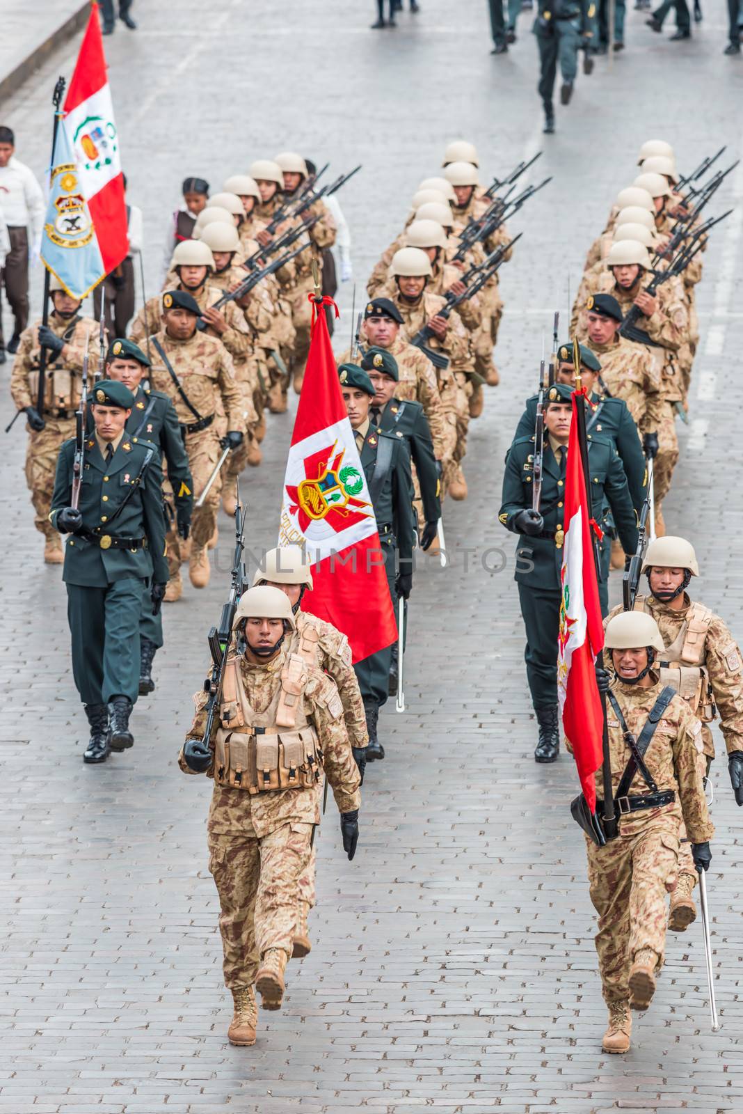 Cuzco, Peru - July 14, 2013: army parade in the Plaza de Armas at Cuzco Peru on july 14th, 2013