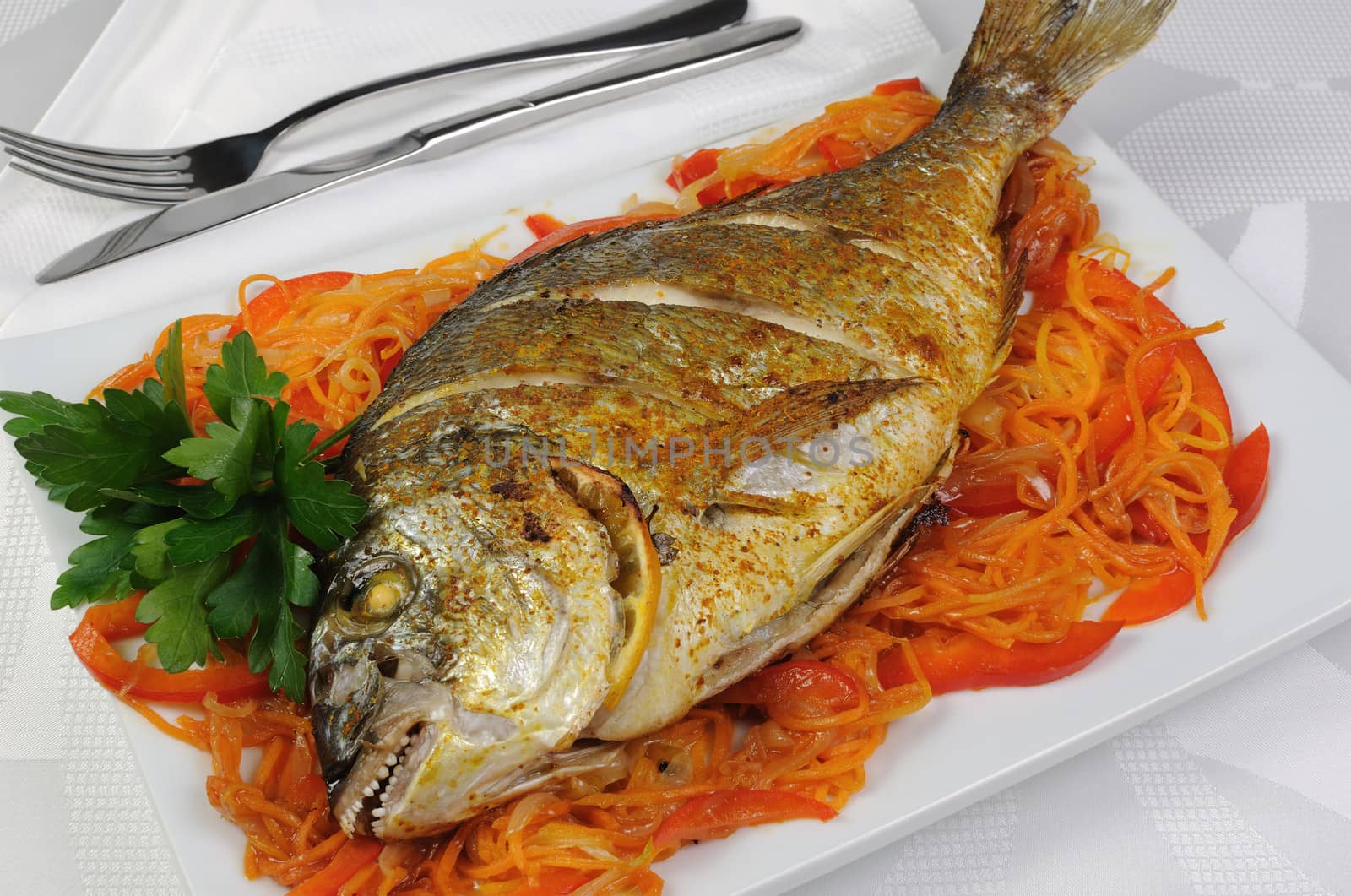Fried Fish (Dorado) on vegetable cushion