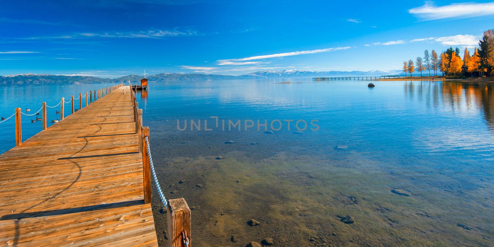 Pier in a lake by CelsoDiniz