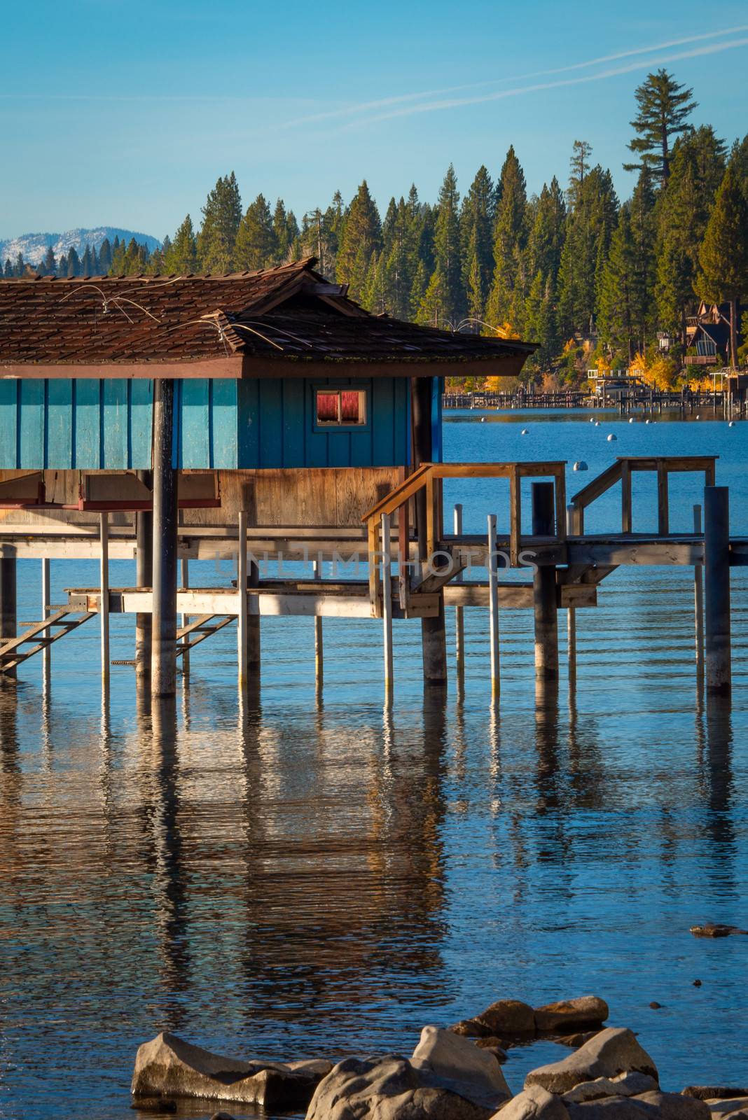 Stilt hut in a lake by CelsoDiniz