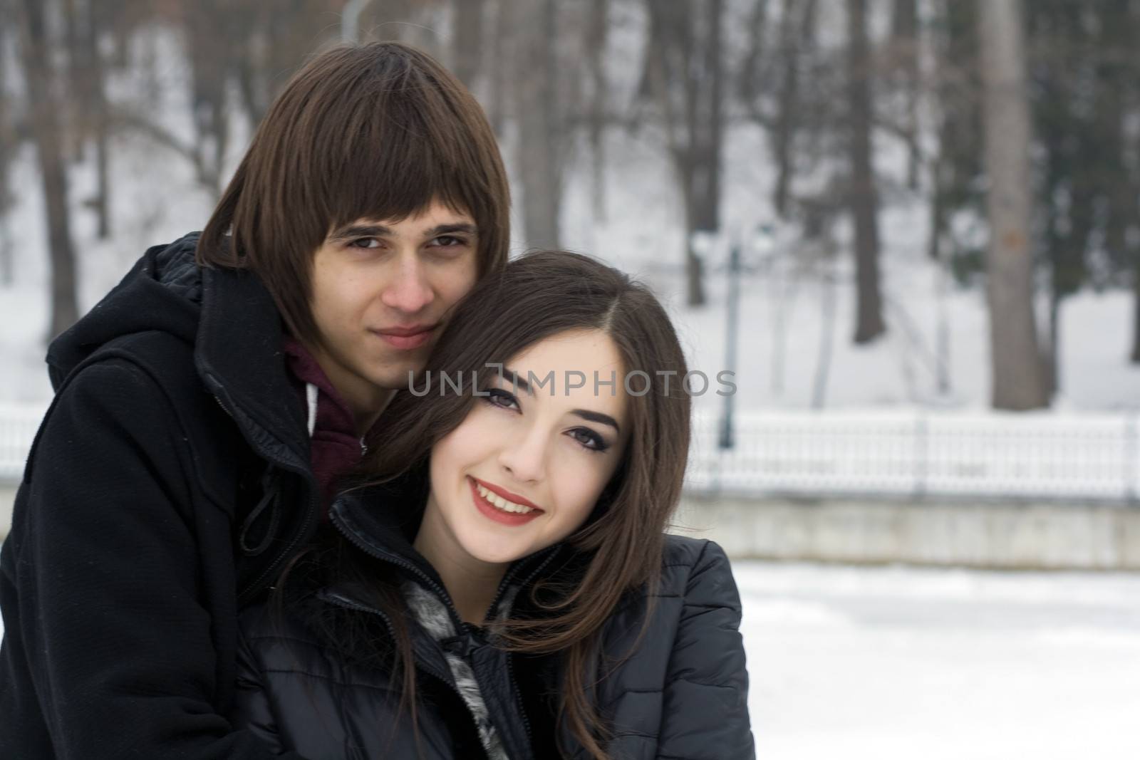 Young couple in winter park by Irina1977