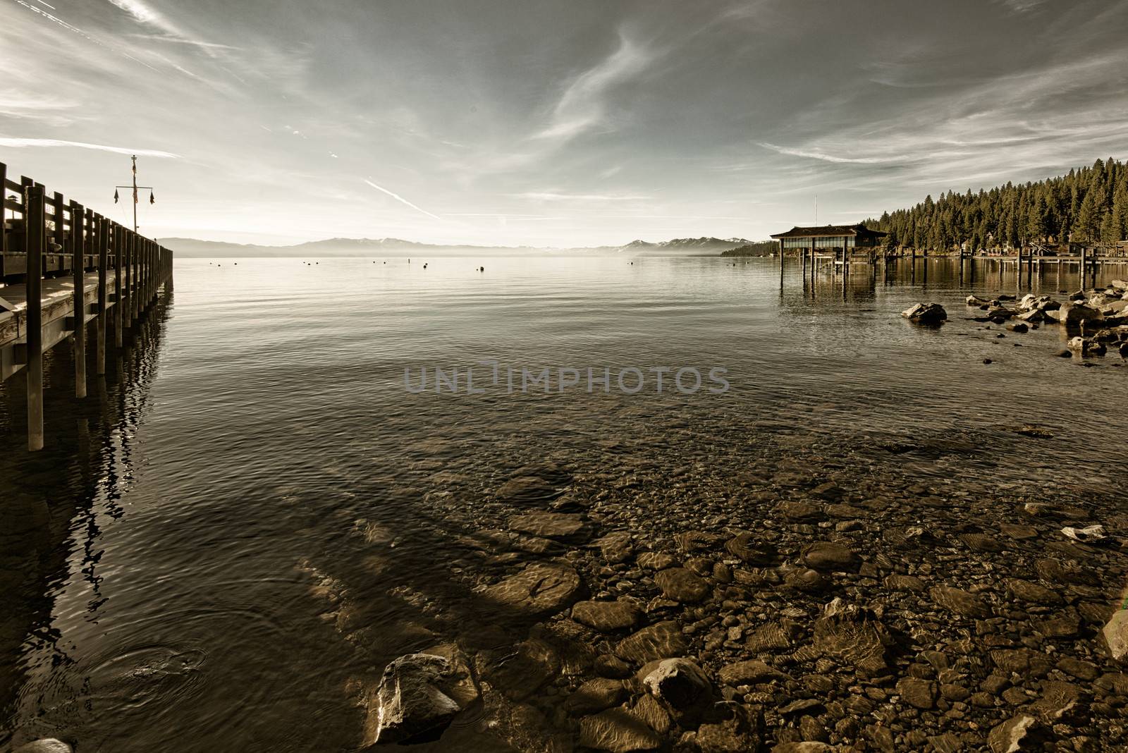 Pier in a lake by CelsoDiniz