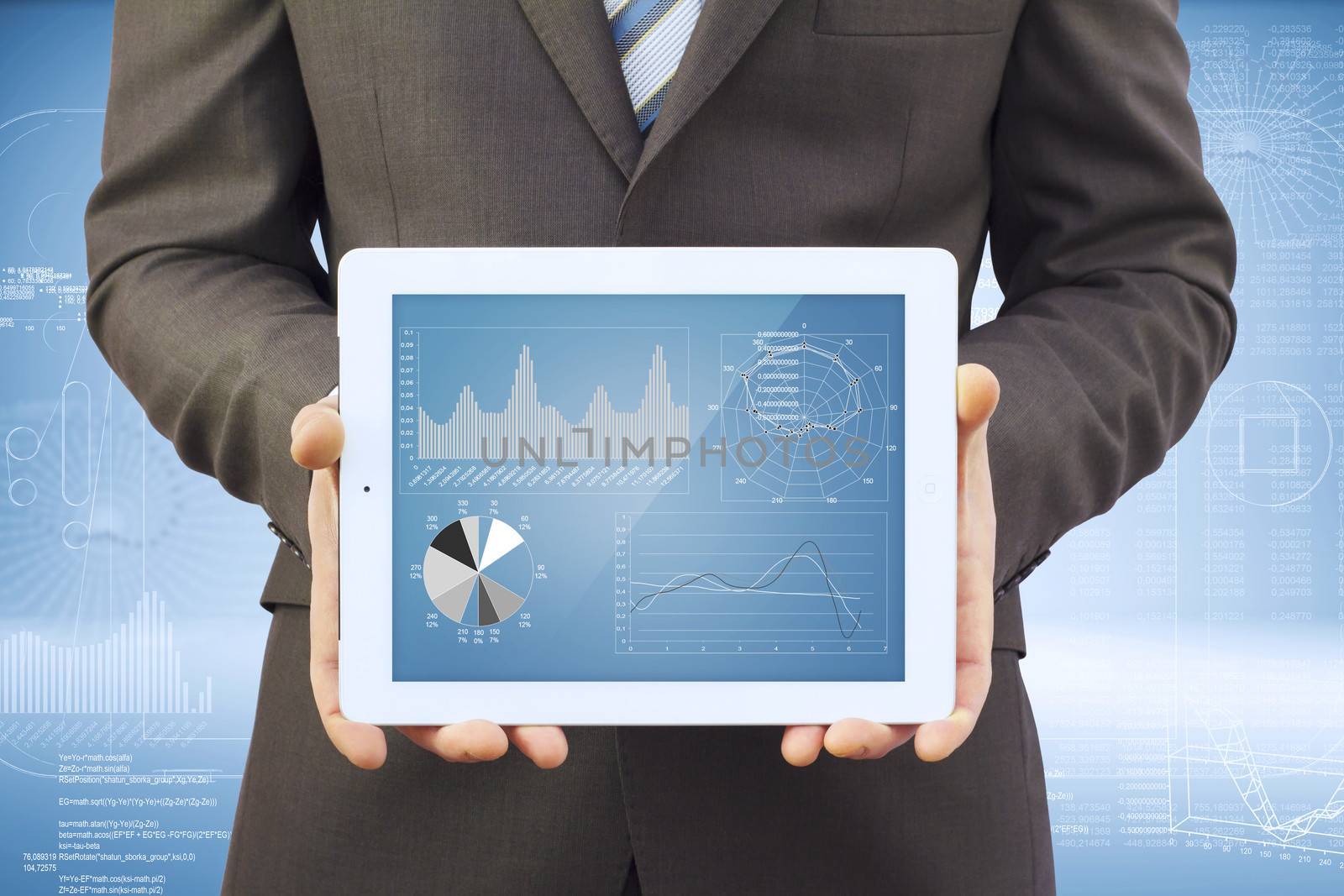 Businessman in a suit holding a tablet computer. The screen tablet - graphics