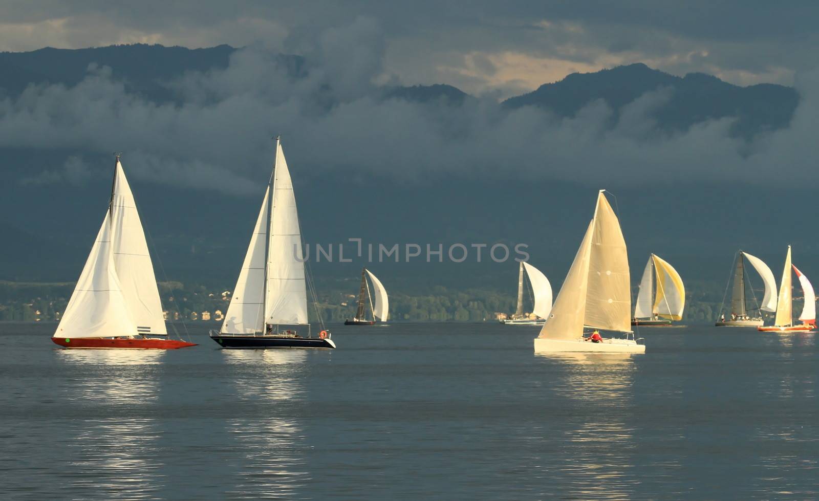 Sailboat race by sunset by Elenaphotos21