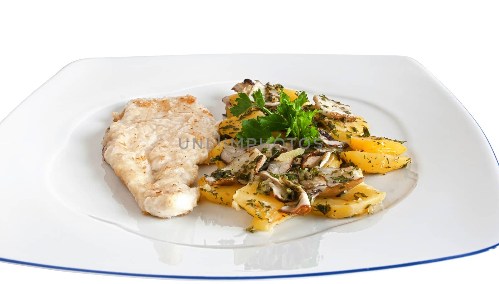 chicken escalope with baked potatoes and mushrooms isolated on white with clipping path