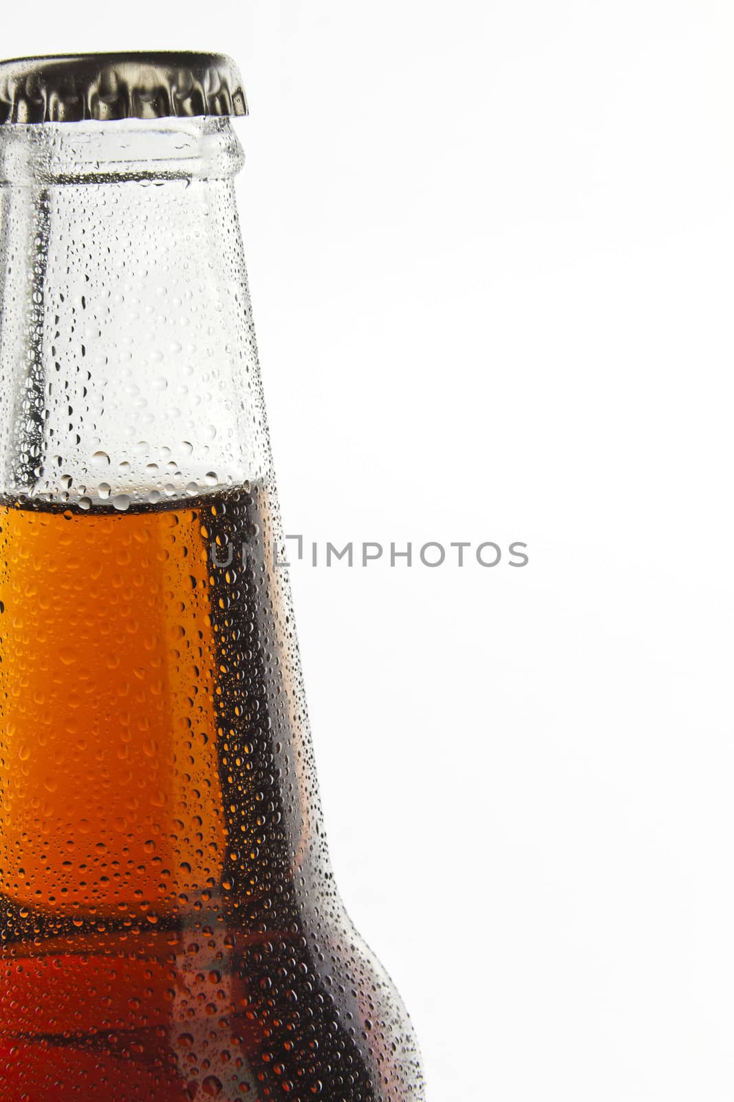 Soda bottle light non-alcoholic drink with water drops