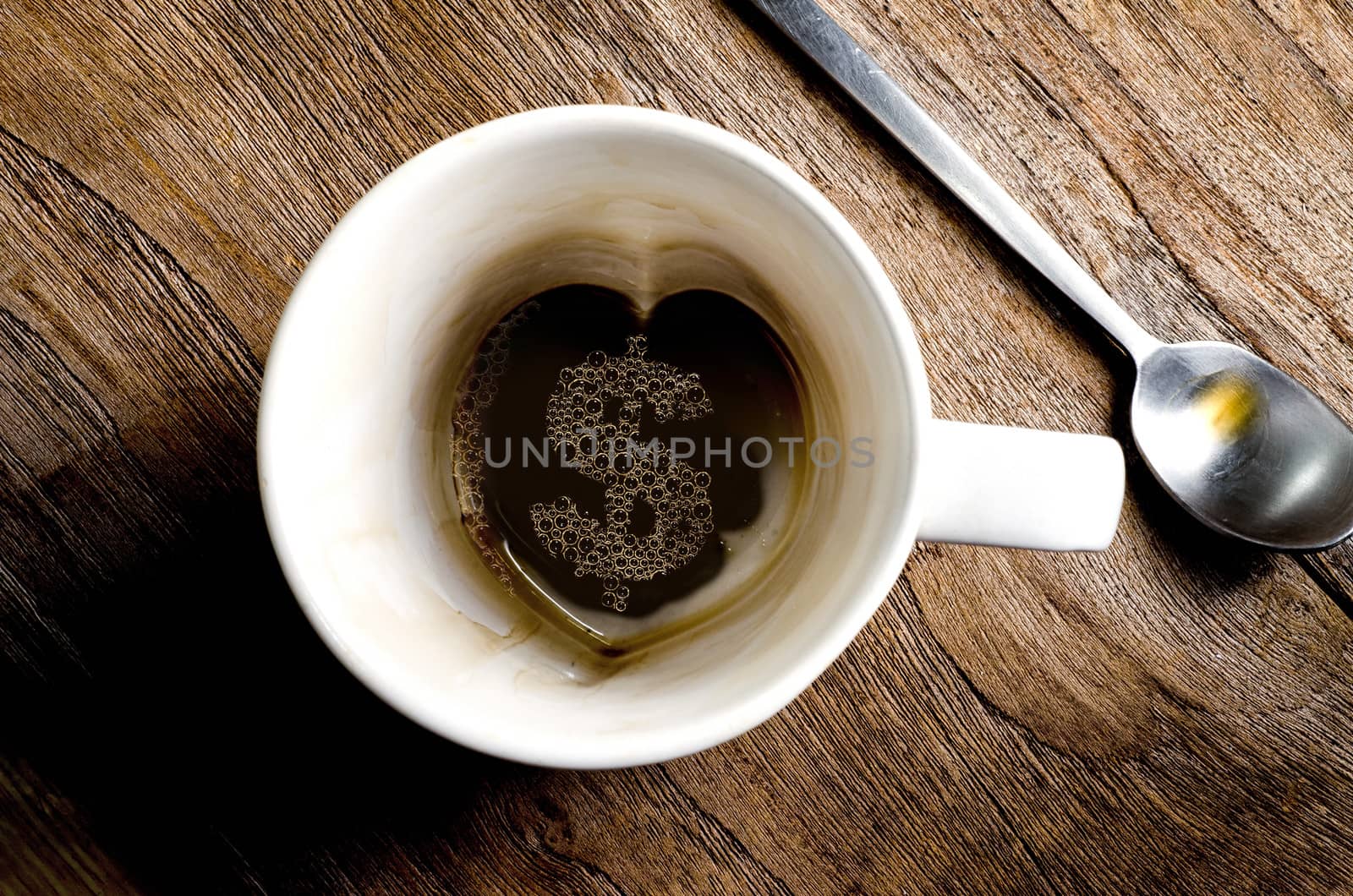 Empty coffee mug, with stains. Overhead view,- Dollar Sign. 