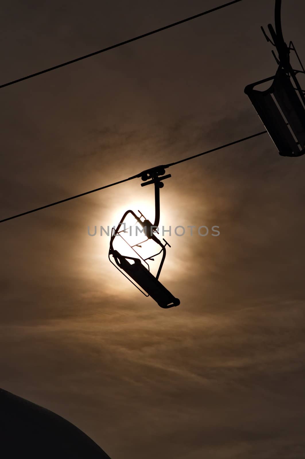Empty ski lift silhouette by anderm