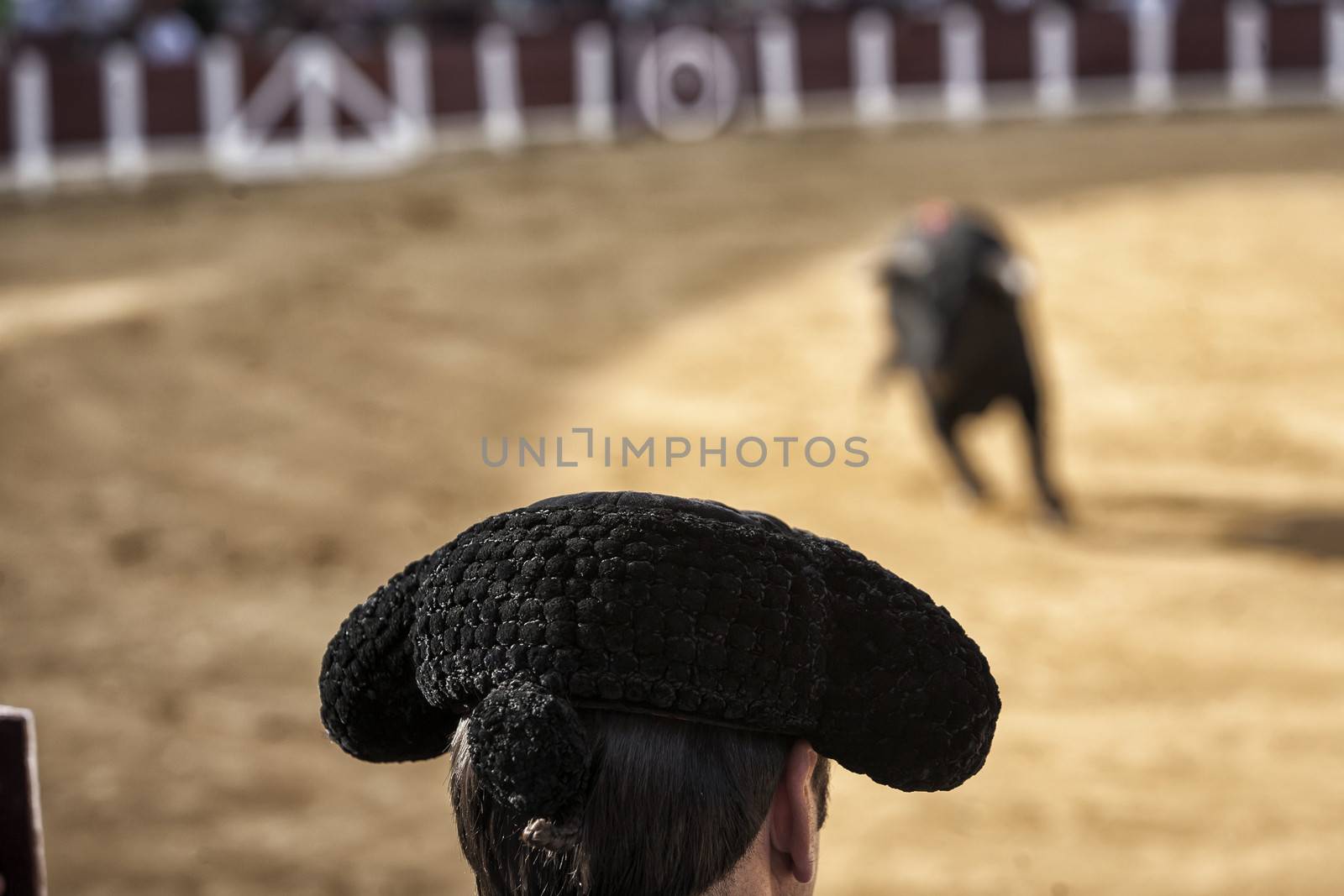 Ubeda, Jaen province, SPAIN - 2 october 2010: Spanish bullfighter overlooking the bull during a bullfight held in  in Ubeda, Jaen province, Spain