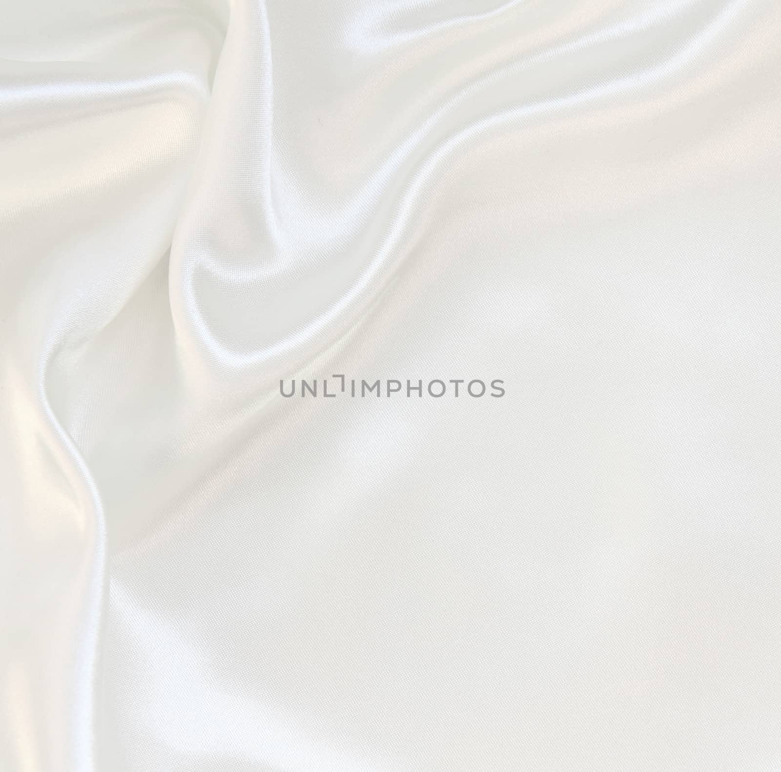 Smooth elegant white silk can use as wedding background 