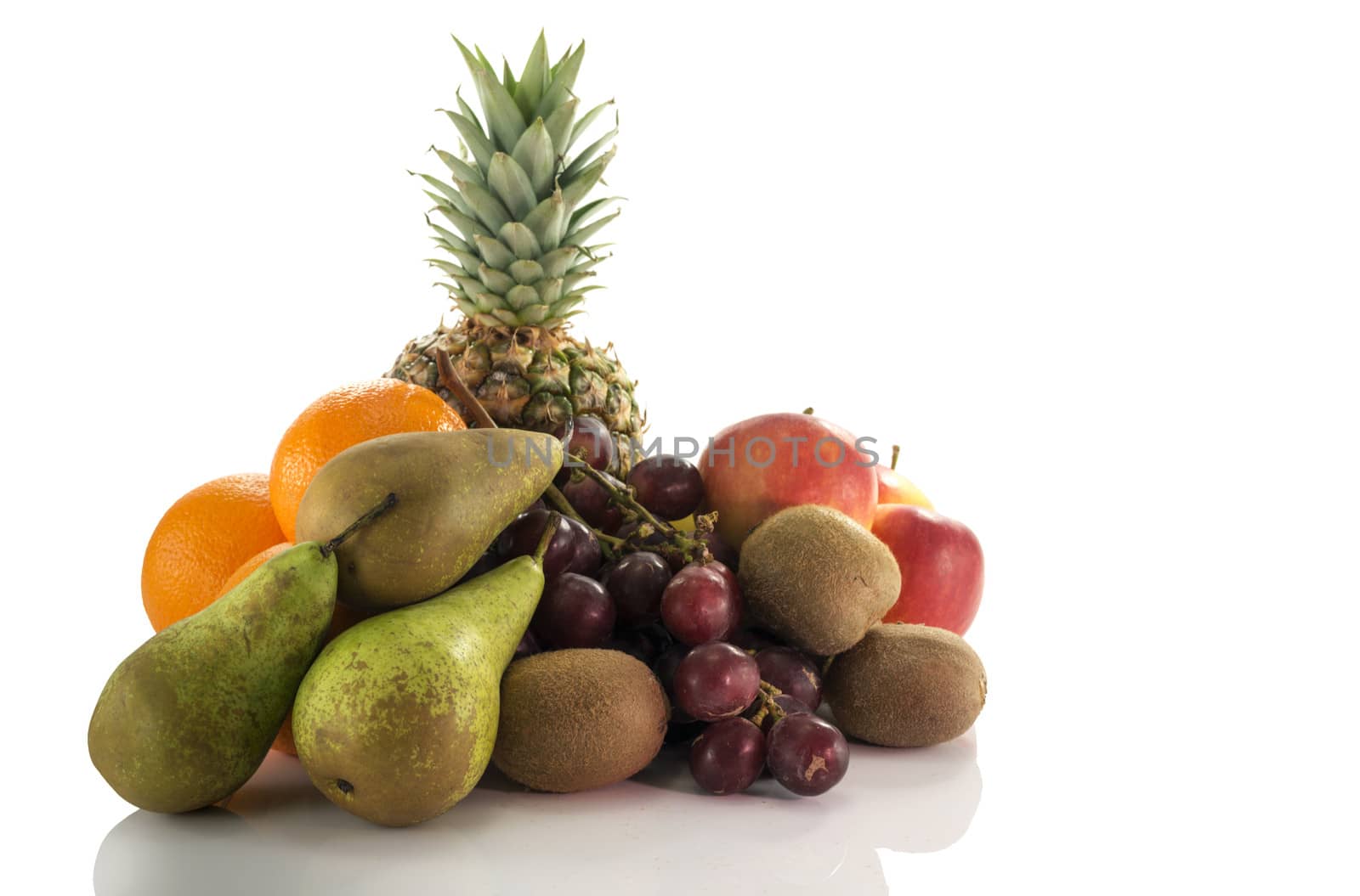 fruit as oranges pineapple grapes pear apple and kiwi isolated on white