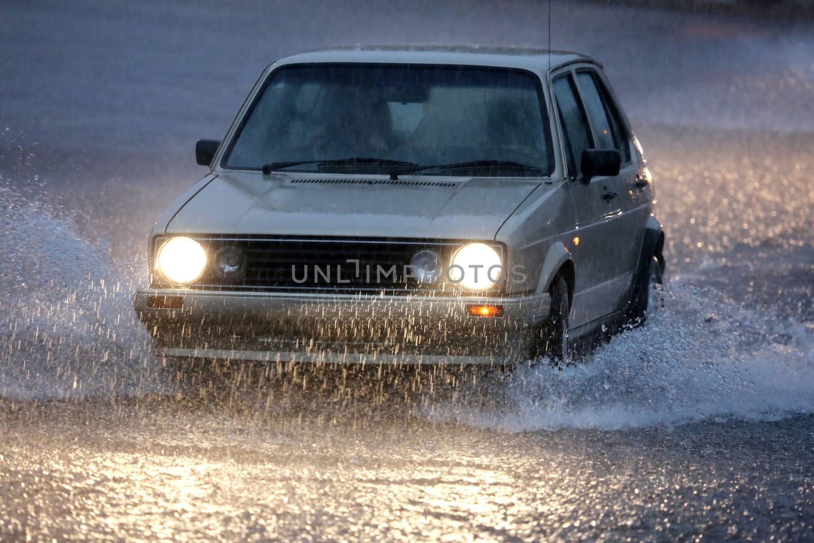 Vehicle Driving in Heavy Rain by fouroaks