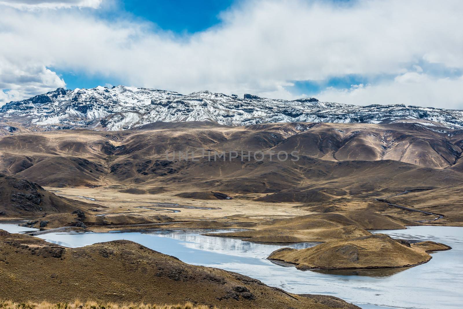 aerial view of Lagunillas in the peruvian Andes at Puno Peru by PIXSTILL