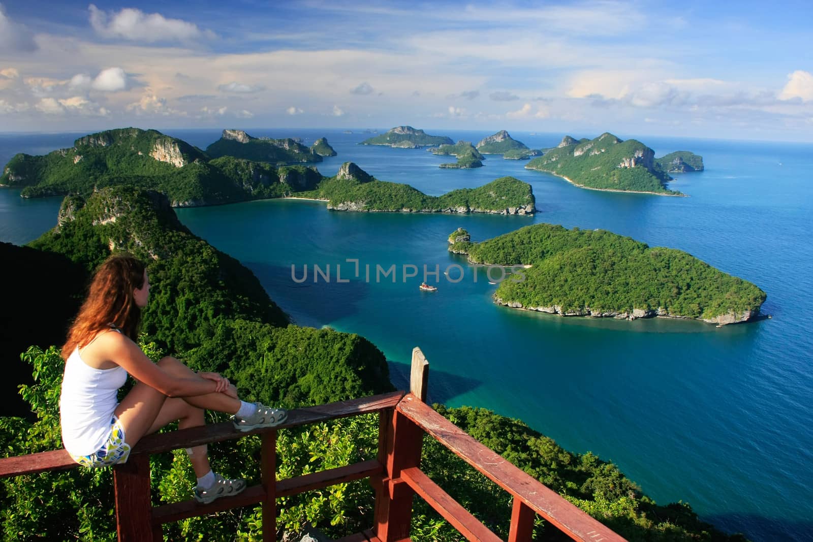 Young woman sitting at the view point, Wua Talab island, Ang Thong National Marine Park, Thailand