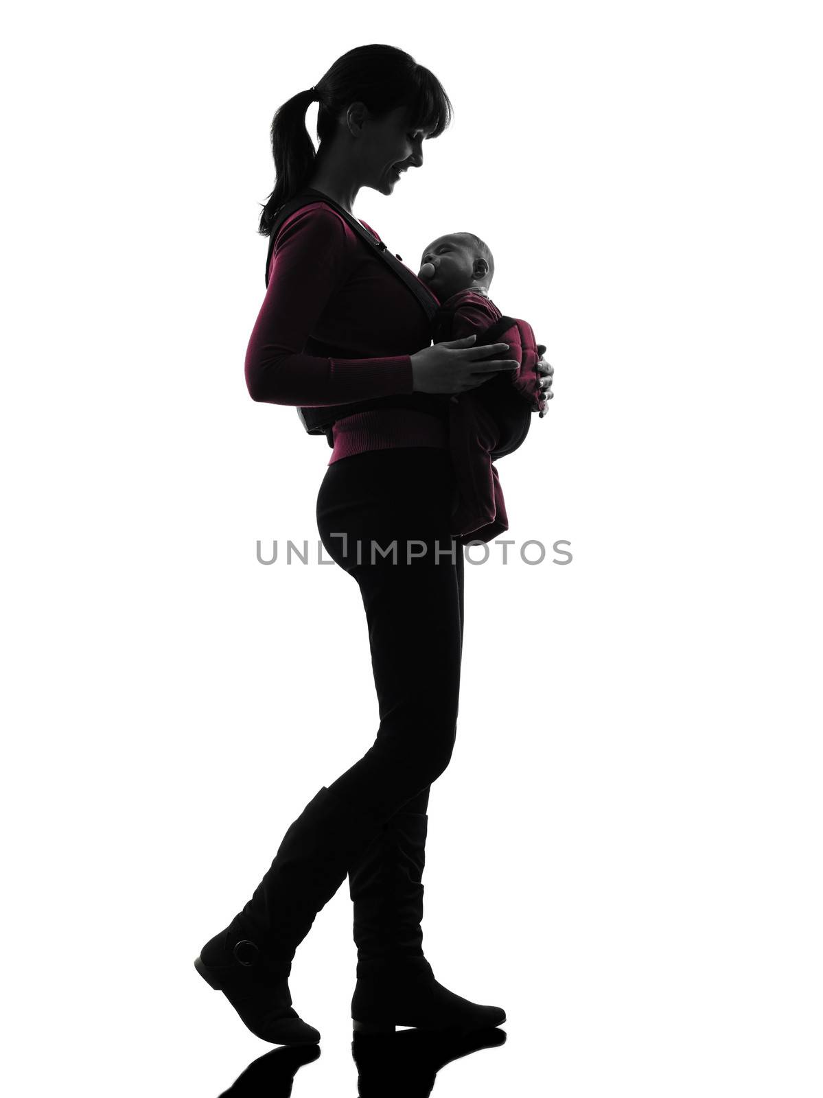 woman mother walking baby silhouette by PIXSTILL