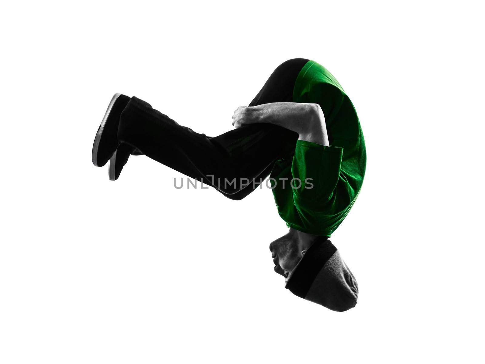 one caucasian young acrobatic break dancer breakdancing man in silhouette  white background