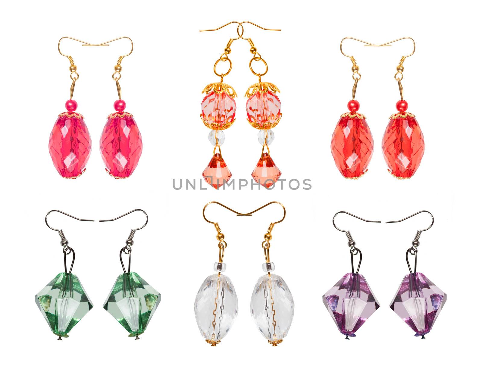 Earrings made and glass isolated on white background in different colors. Six pairs. Collage. 