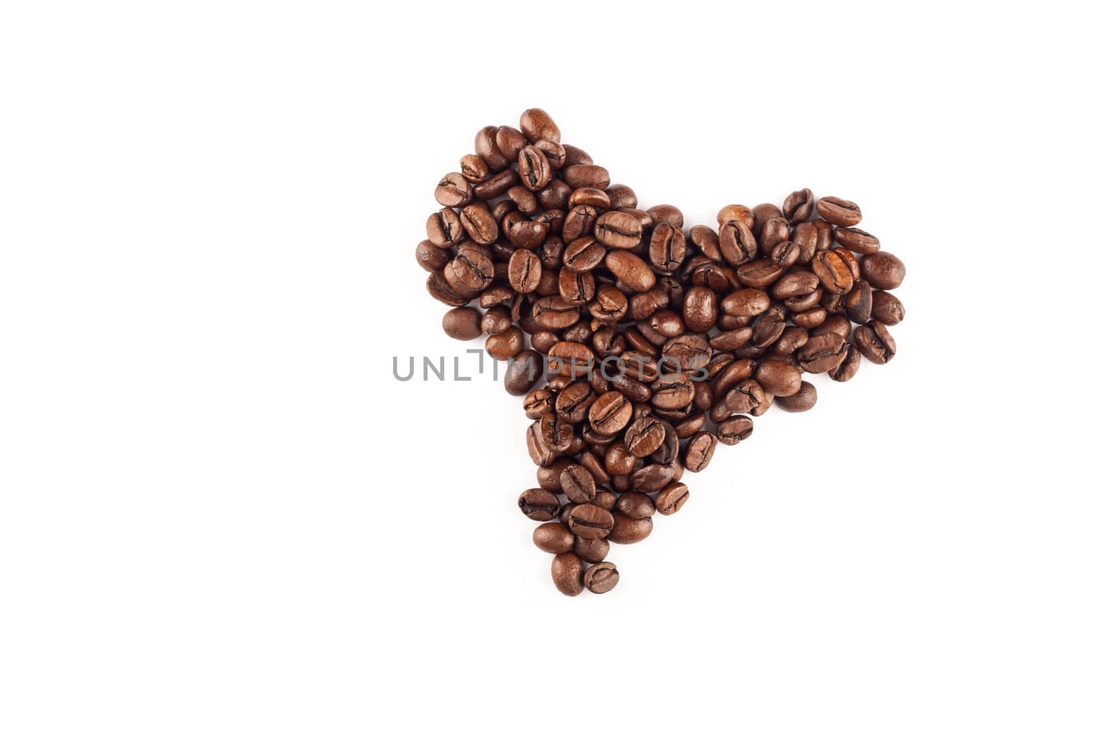 Coffee beans arranged in a heart shape.