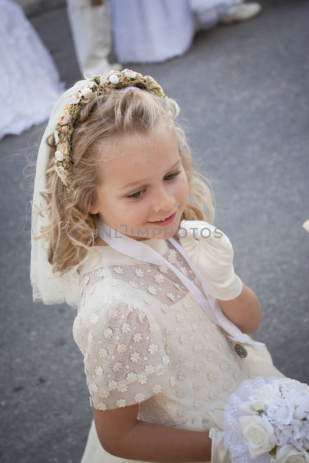 Girl in holy communion dress and veil by annems