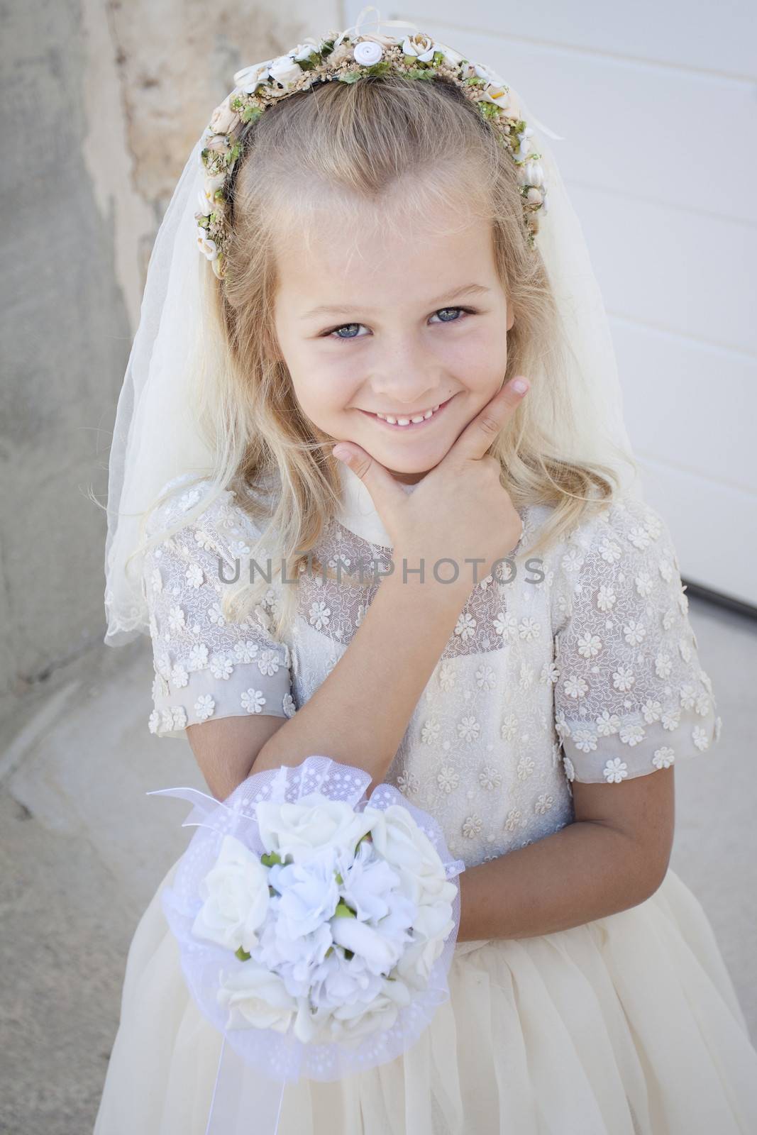 Girl in holy communion dress and veil by annems