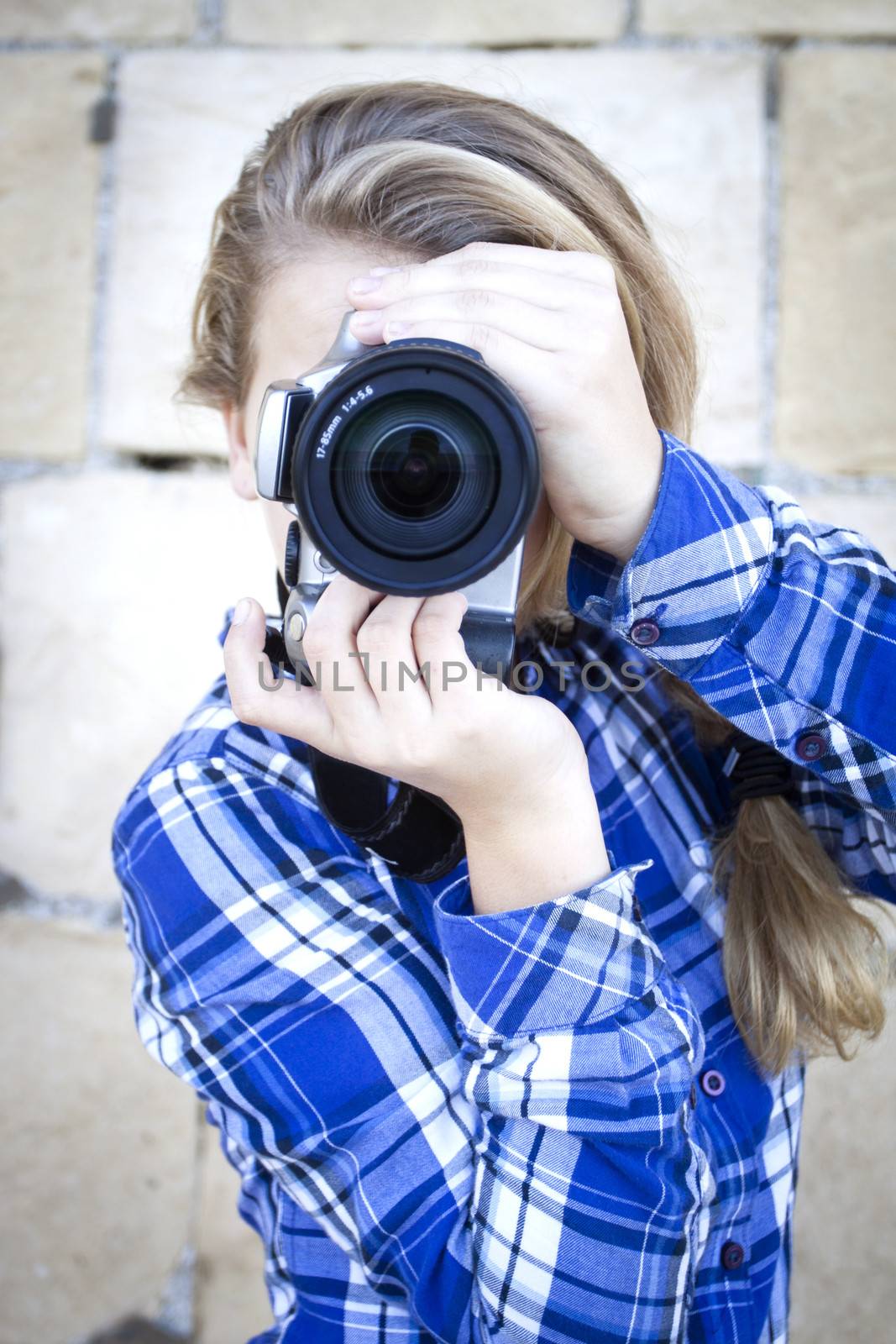 Teenager with camera by annems